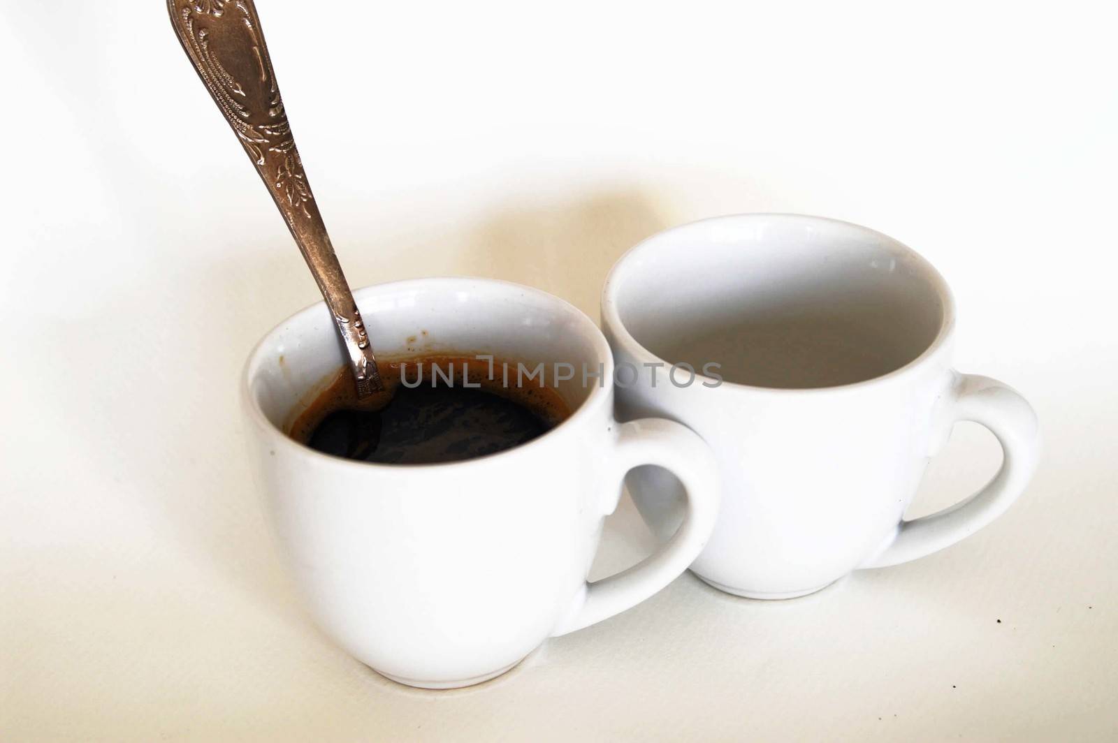 Coffee cup with a spoon, isolated