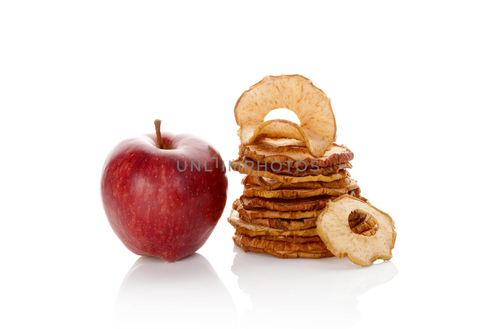 Dry apples isolated on white background. Healthy snack eating.