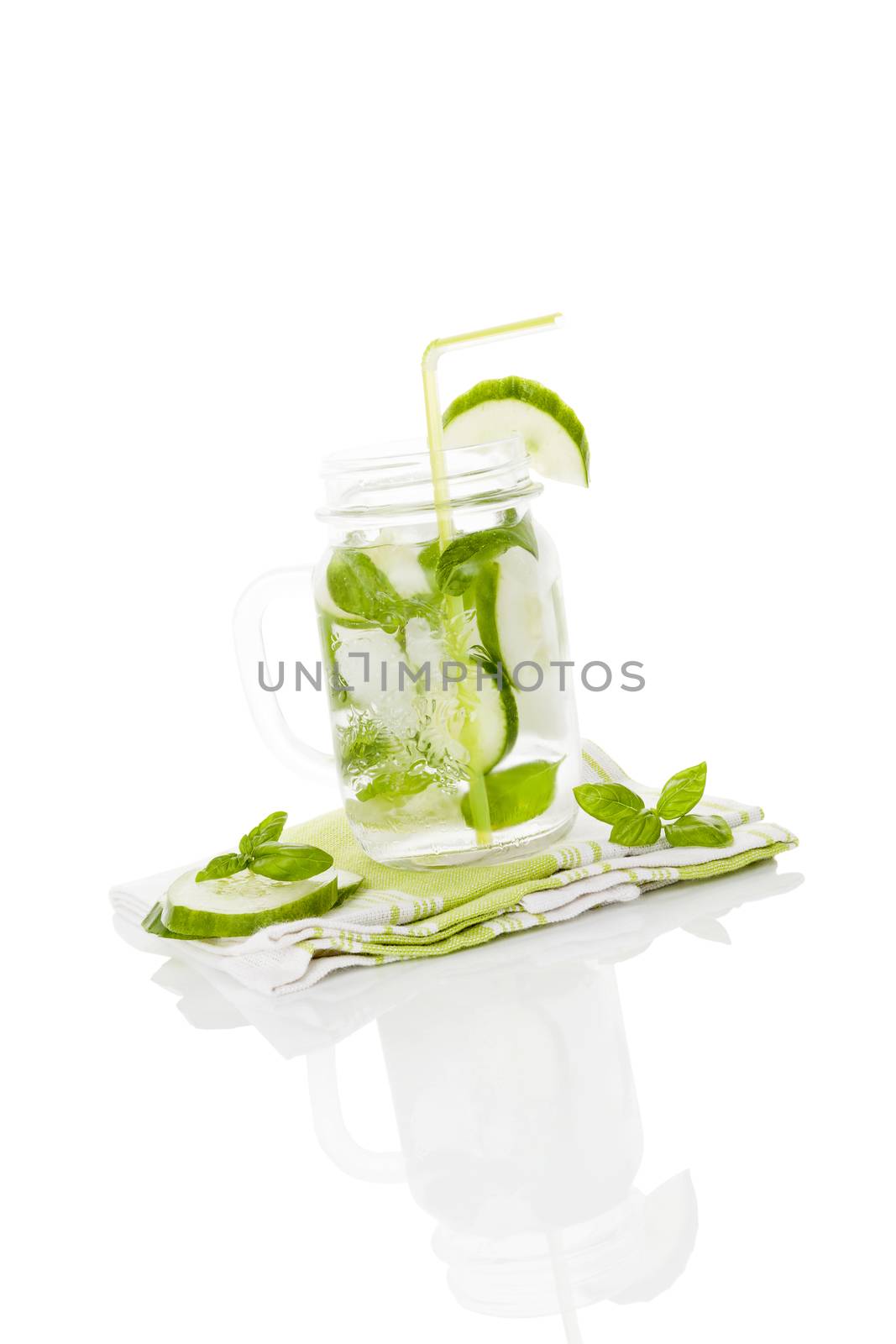 Cucumber lemonade isolated on white background. Healthy summer drink.