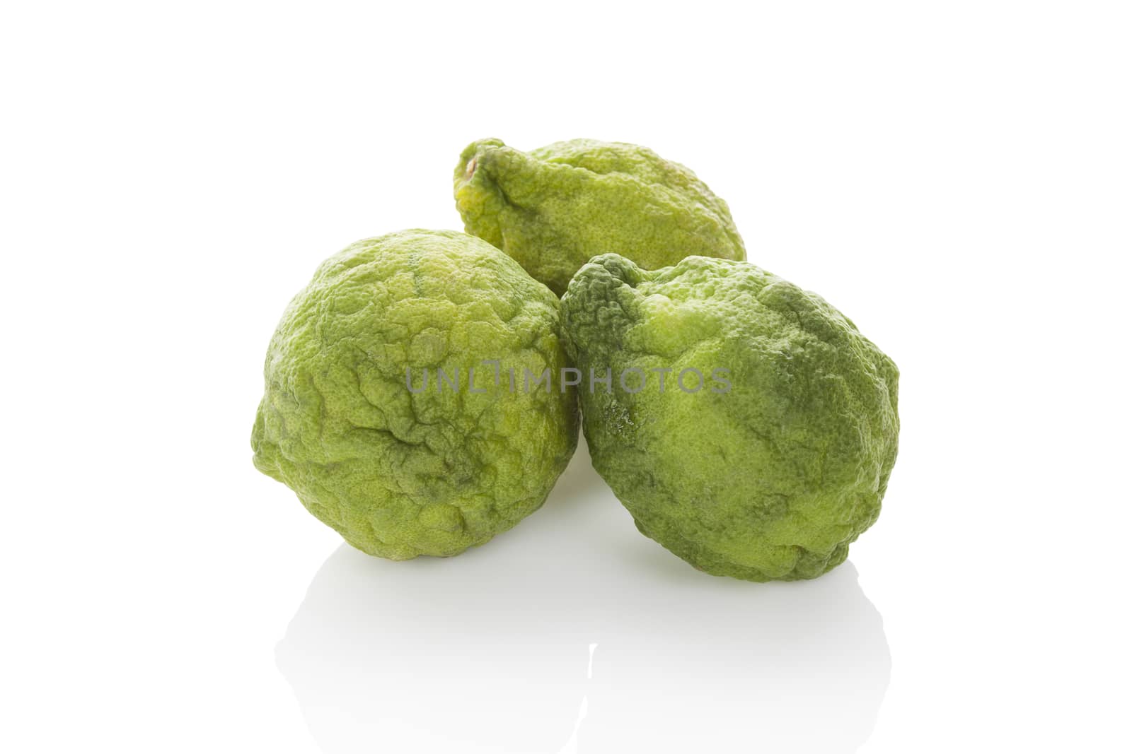 Bergamot oranges isolated on white background. Culinary asian tropical fruit eating.