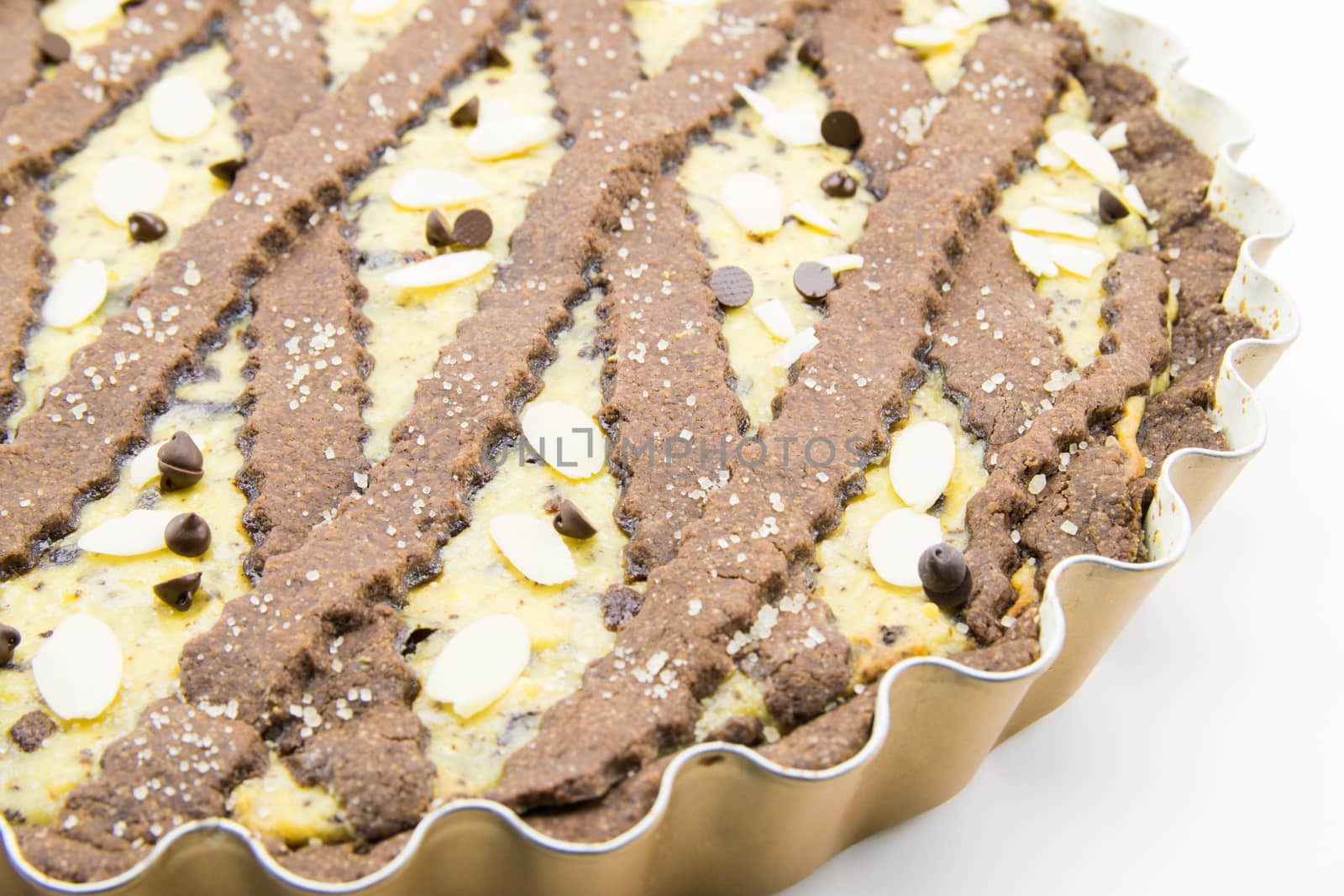 freshly baked cocoa tart with ricotta cheese and chocolate