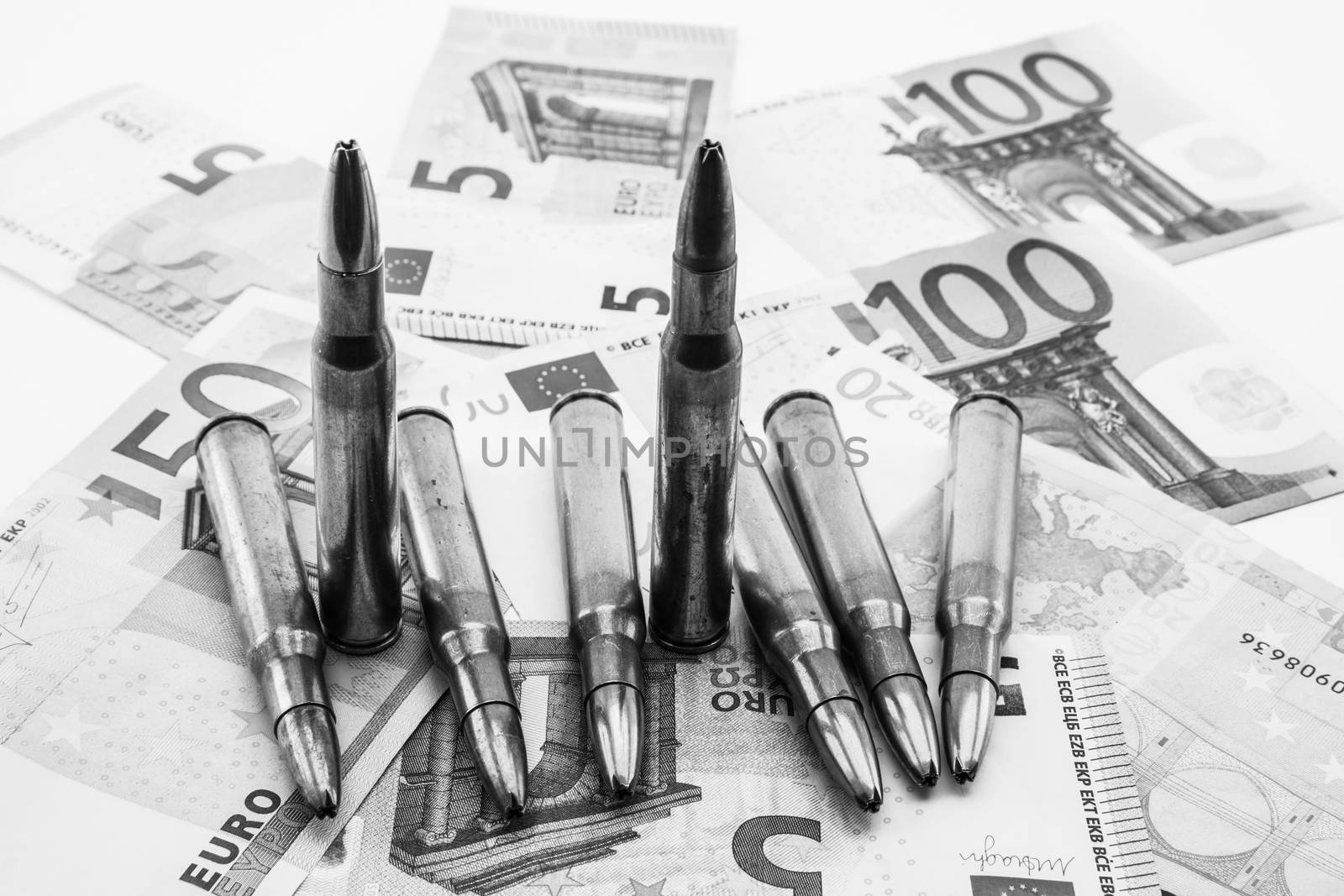 composition with bullets and banknotes