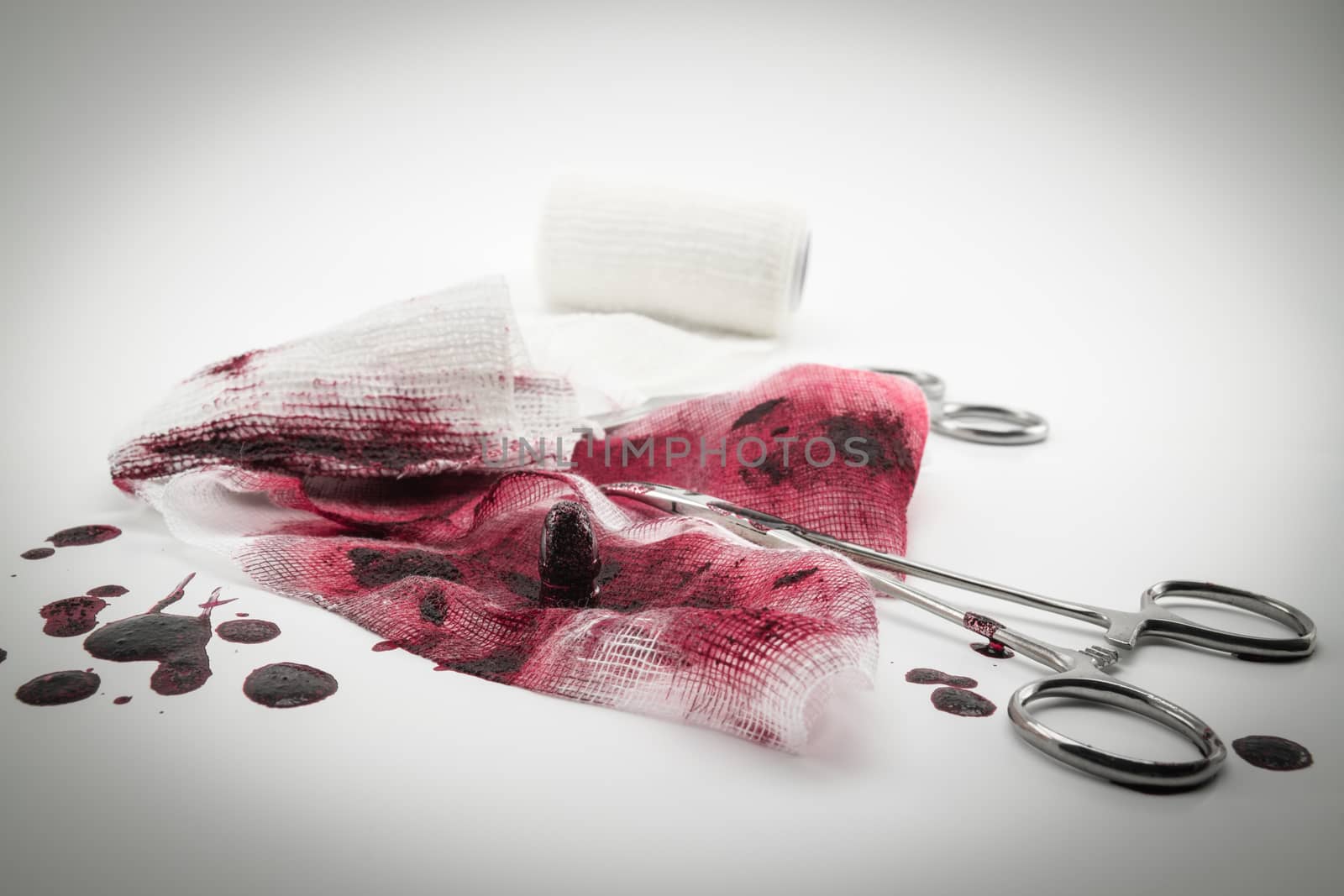 Surgical composition with bullet, blood and bandage