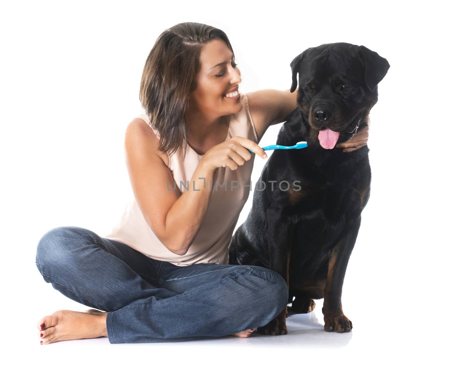 young woman and rottweiler by cynoclub