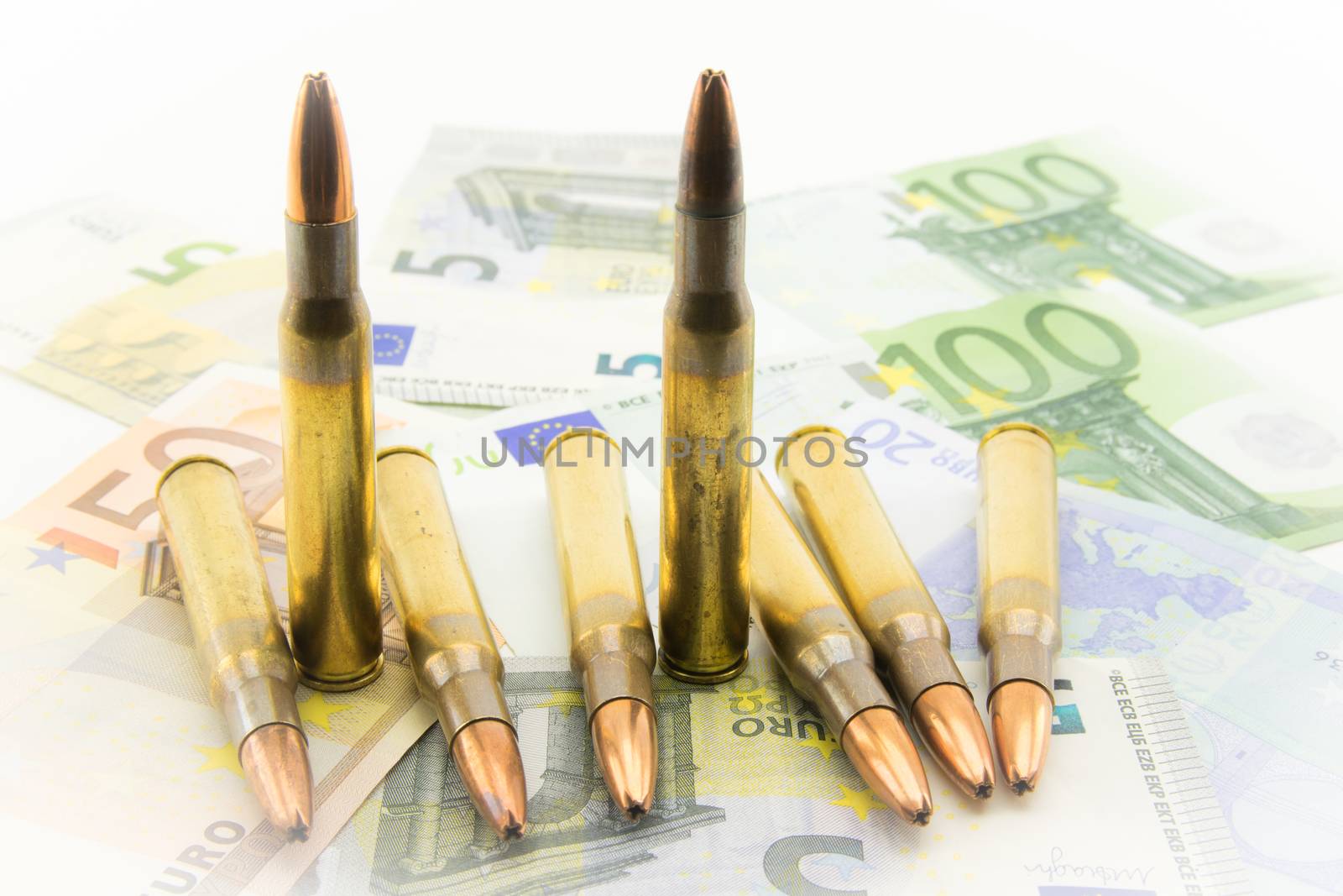 composition with bullets and banknotes