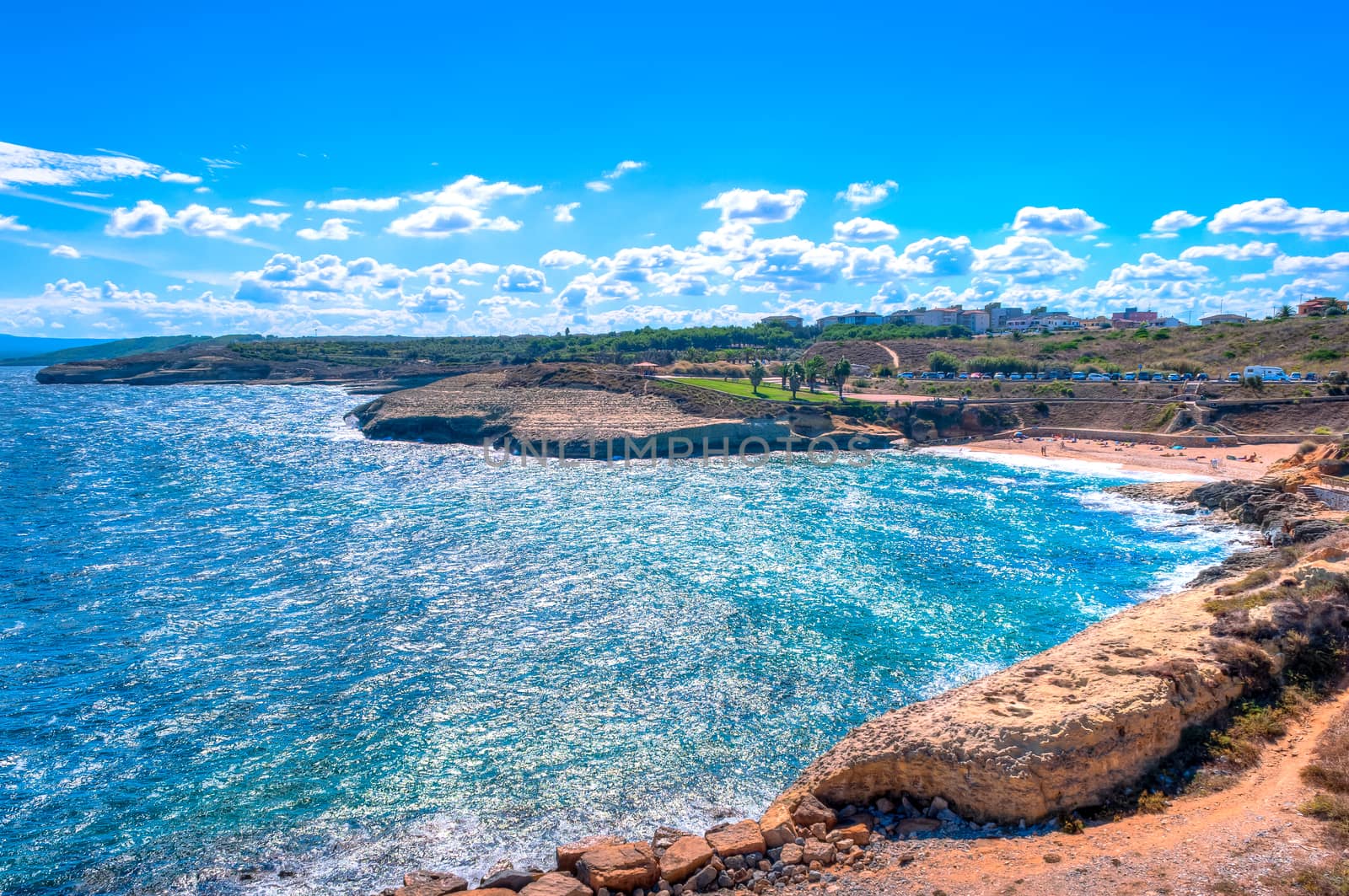 beach near the city of porto torres, sardinia in a sunny day