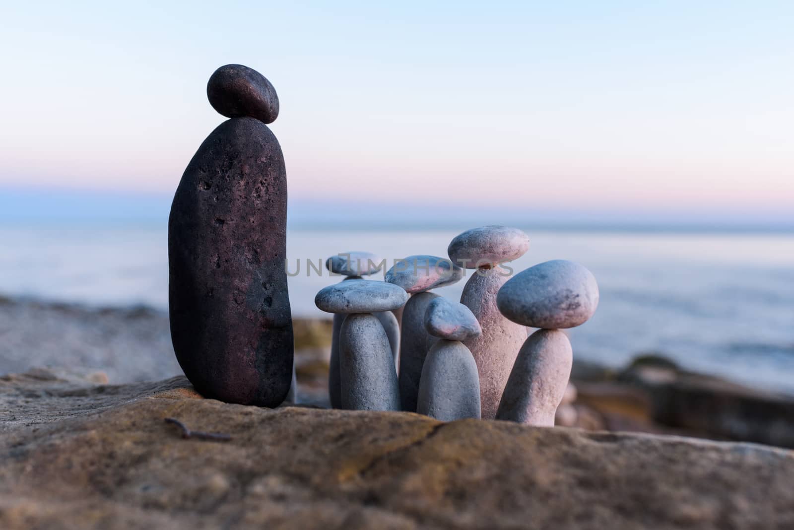 Group of black and white stones on the coast