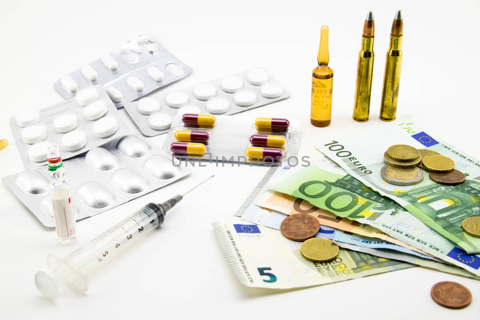 composition with euros, bullets, drugs on white background