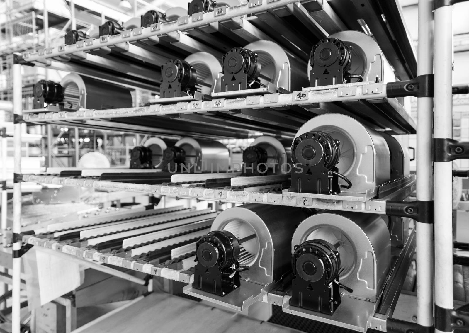 fan motors on the rollers gravitational ready to be used on the assembly line