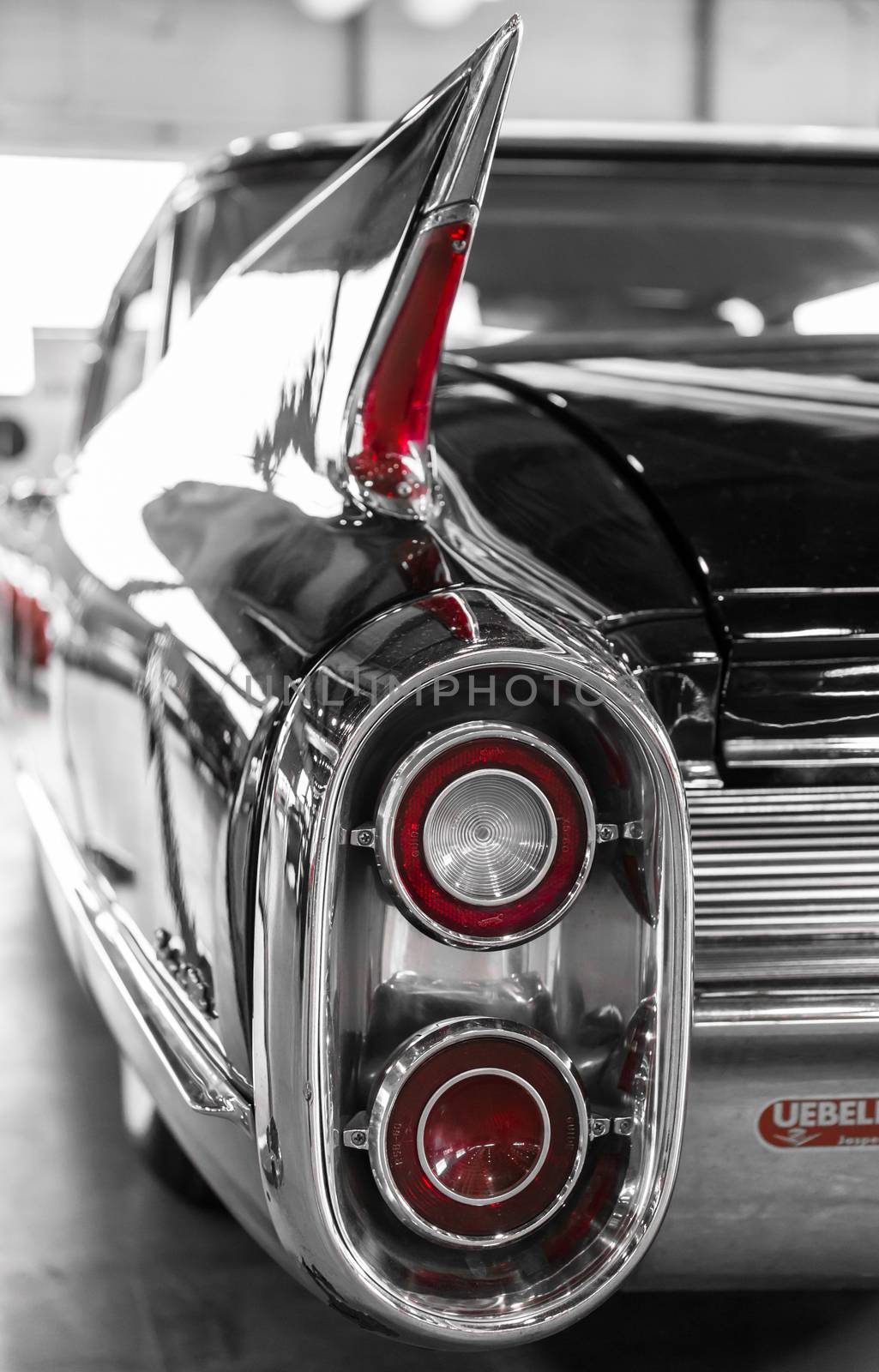 rear lights and distinctive profile of a vintage American car by Isaac74