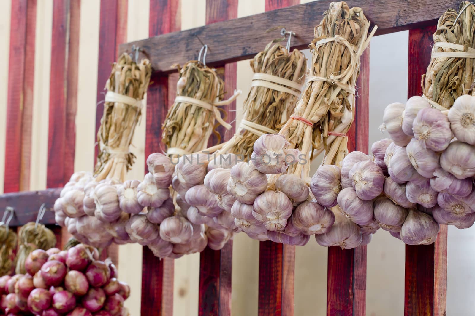 Shallots hanging in Thai Market Style by art9858