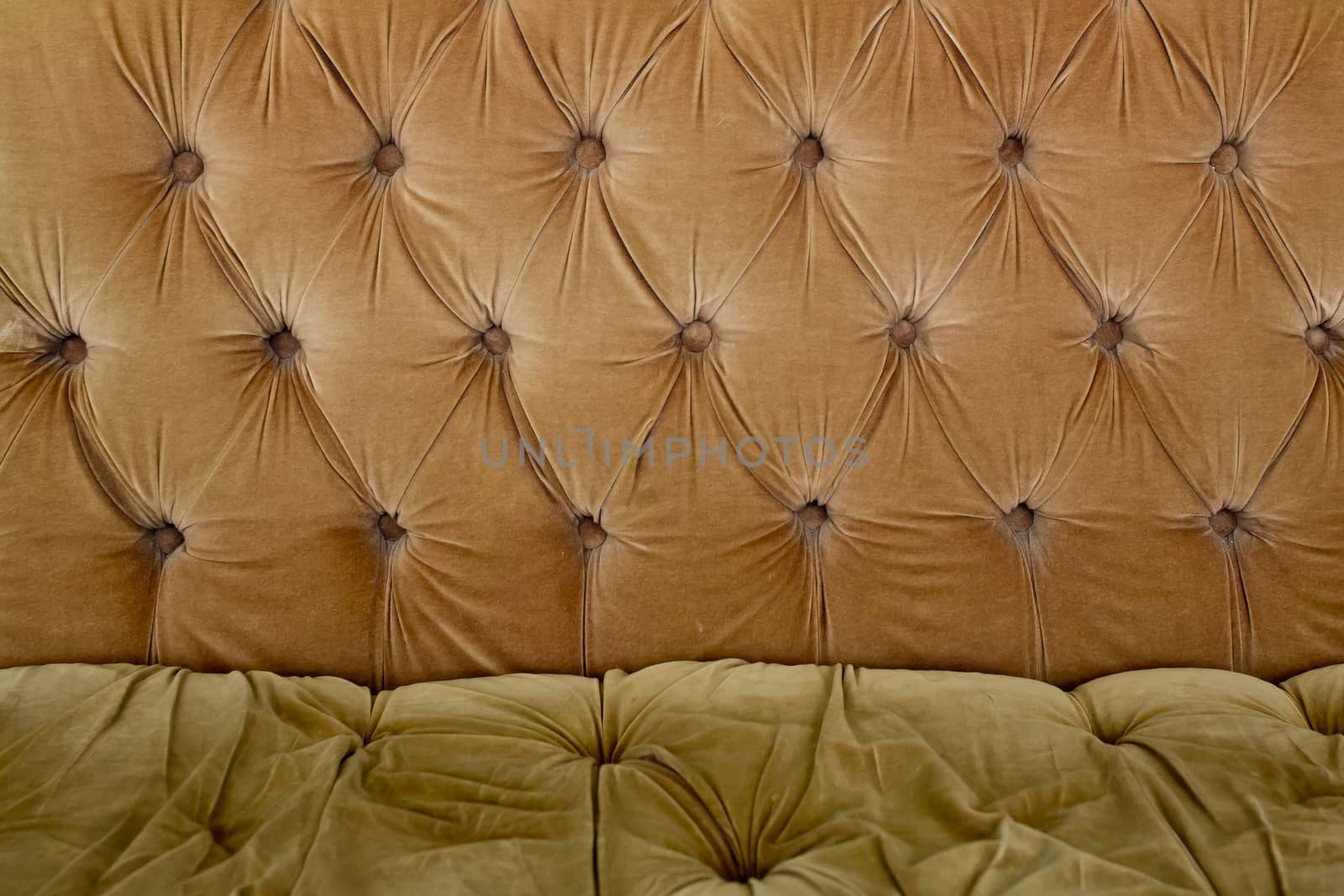 Brown couch background texture with sunken buttons by art9858