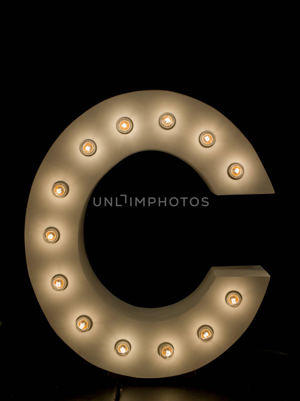modern lighting "C" alphabet isolated on black background