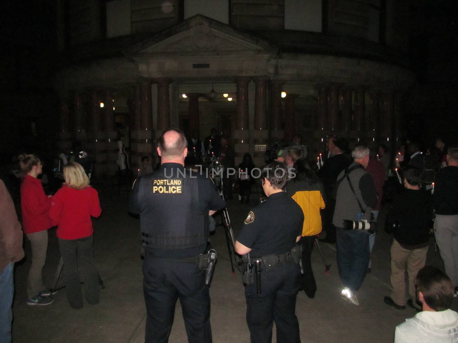 US, Portland: Religious leaders, police and locals attended a vigil outside Portland City Hall on September 1, 2015, following a mass shooting at Umpqua Community College, Roseburg. 13 people are now confirmed to have been shot dead at the college. Members of the Oregon Symphony also played at the vigil.