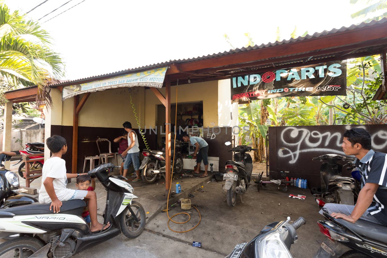BALI, NUSA PENIDA ISLAND, INDONESIA - JULY 28.2015: Street motorbike service in Toyapakeh. Nusa Penida July 27. 2015 Indonesia