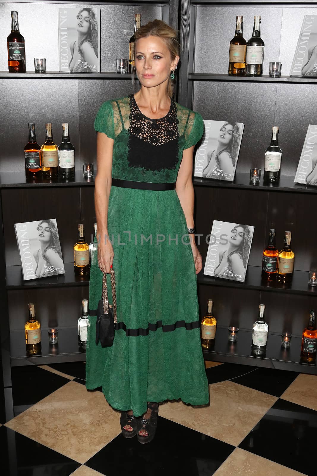 UNITED KINGDOM, London: Laura Bailey attends the joint launch of George Clooney's new tequila label, Casamigos Tequila, and Cindy Crawford's new book Becoming at the Beaumont Hotel in central London on October 1, 2015. 