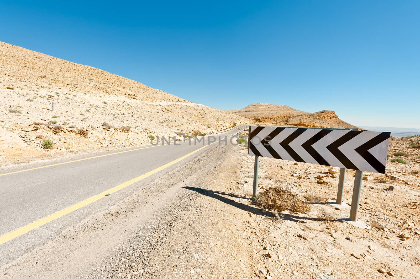 Asphalt Road in the Negev Desert in Israel
