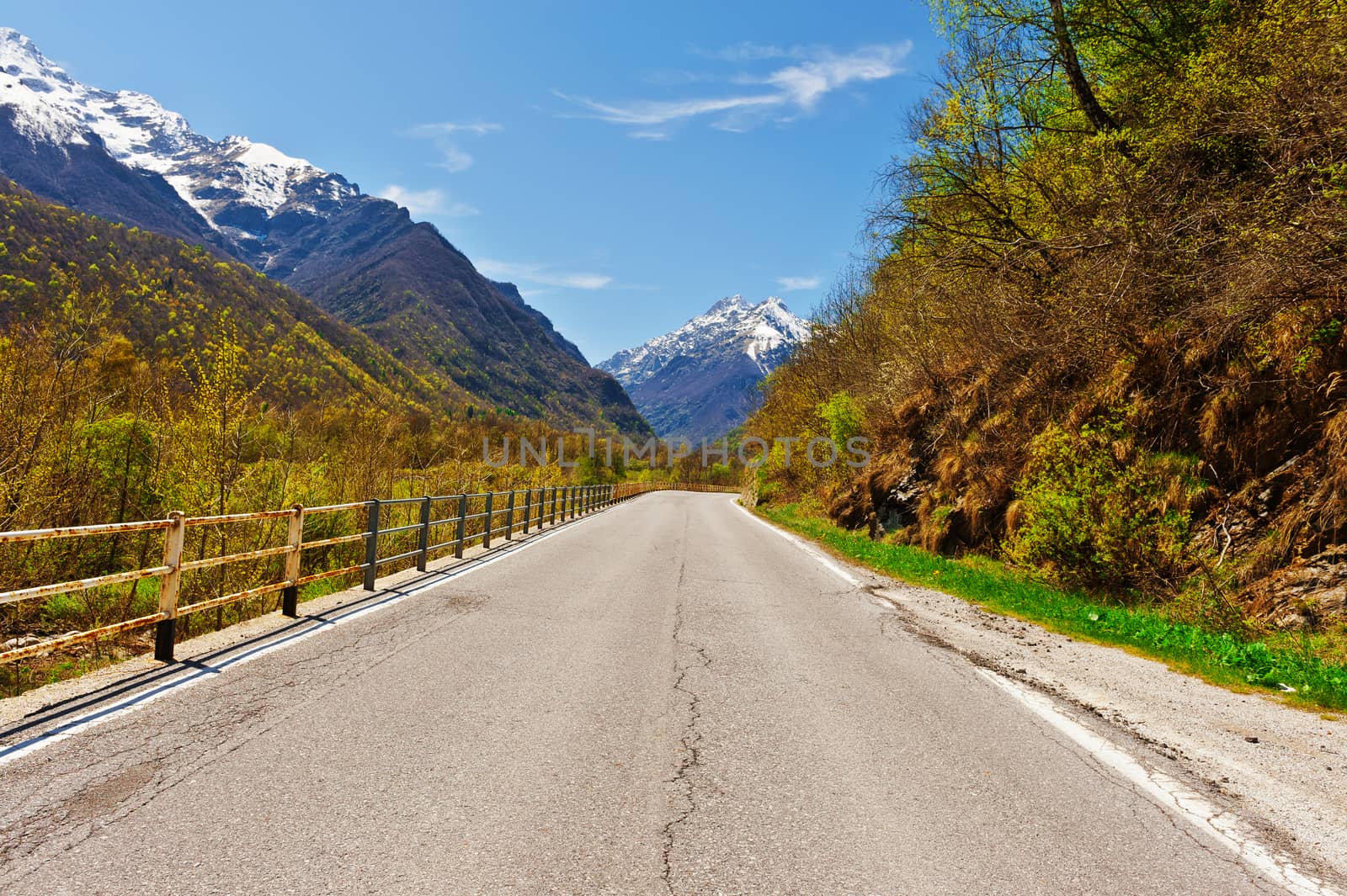 Asphalt Road in Piedmont on the Background of Snow-capped Alps