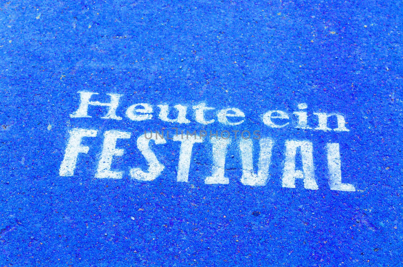 Today a festival marked on a tarmac road in blue color.