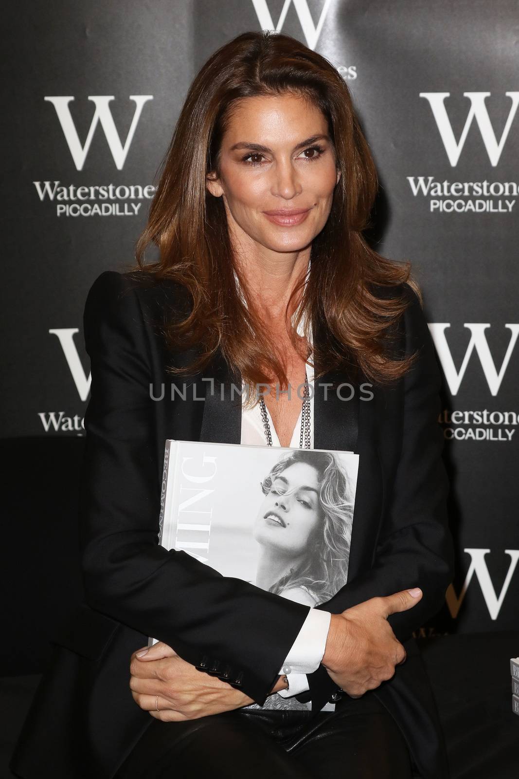 UK, London: American supermodel Cindy Crawford, best known for being one of the five original supermodels discussed her new book and signed copies in Waterstones, London on September 2, 2015. Becoming chronicles her life and career, as she prepares to turn 50 next February, and features some of her most memorable images. 