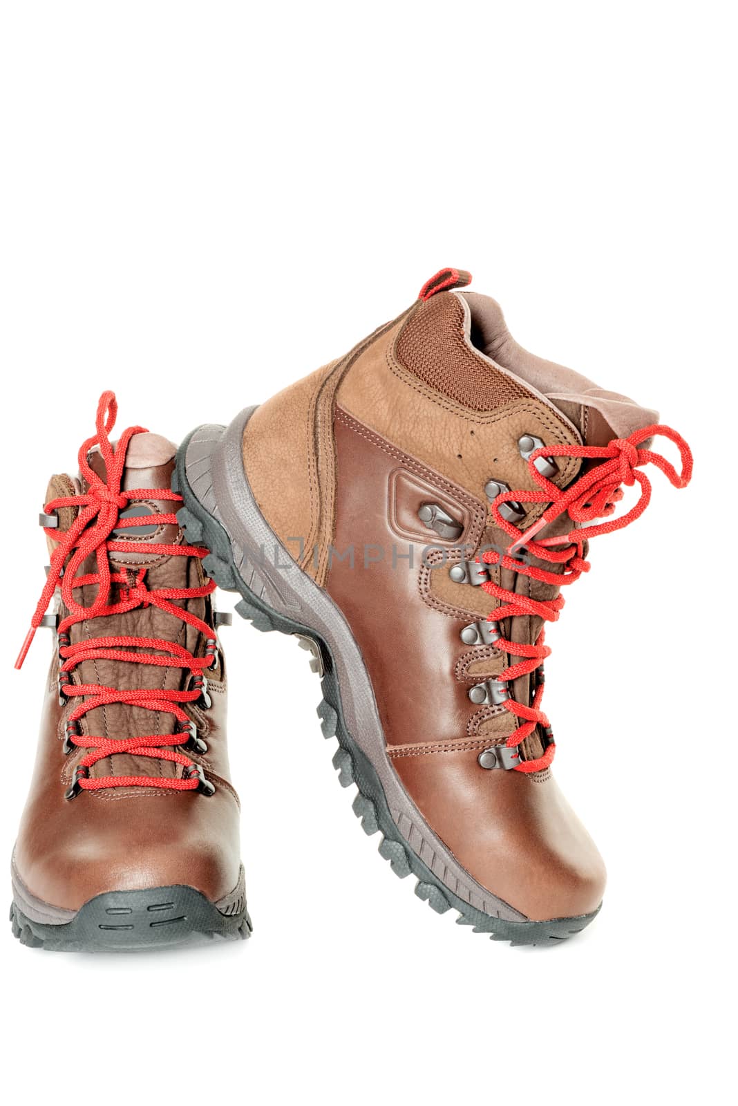 pair of leather hiking boots isolated on white artistic by Nanisimova