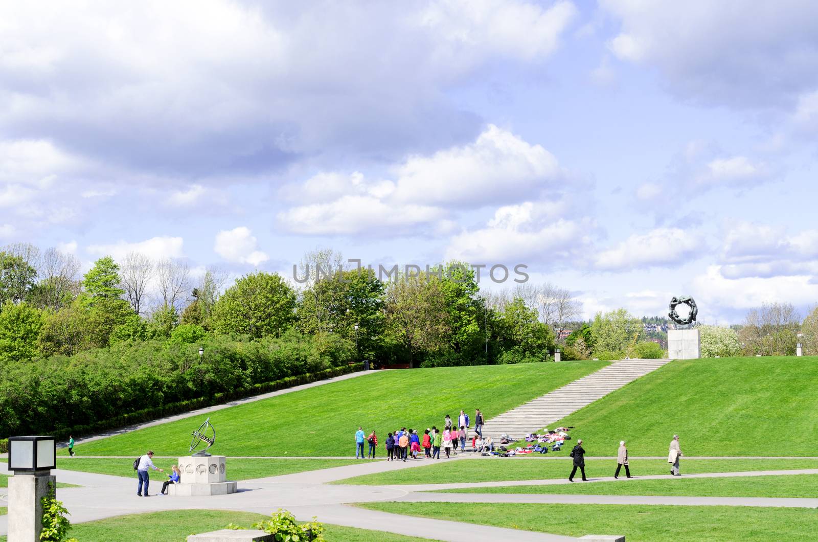 Statues in Vigeland park in Oslo sundial by Nanisimova