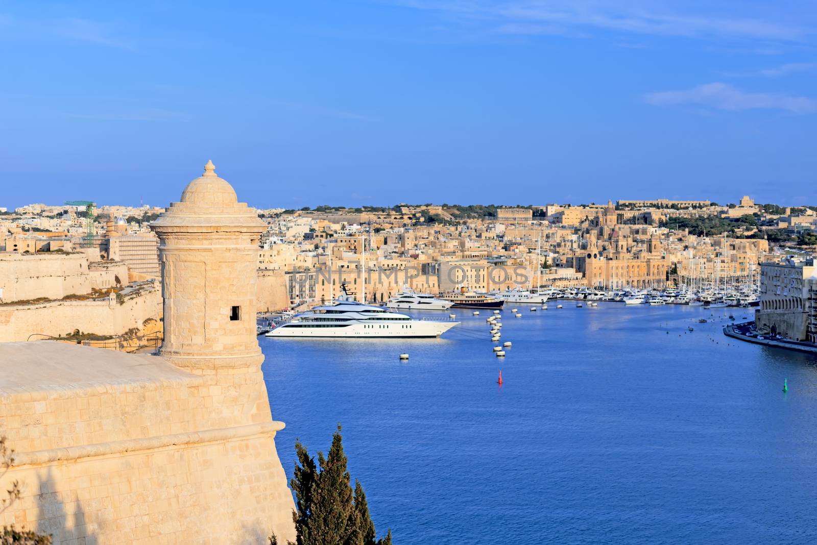 atchtower and fort St. Angelo in Grand Harbour of Valletta by Nanisimova