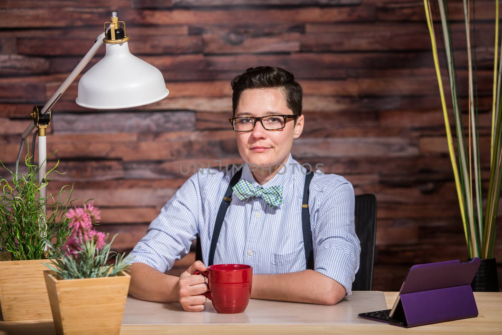 Confident Female in Bowtie with Mug by Creatista