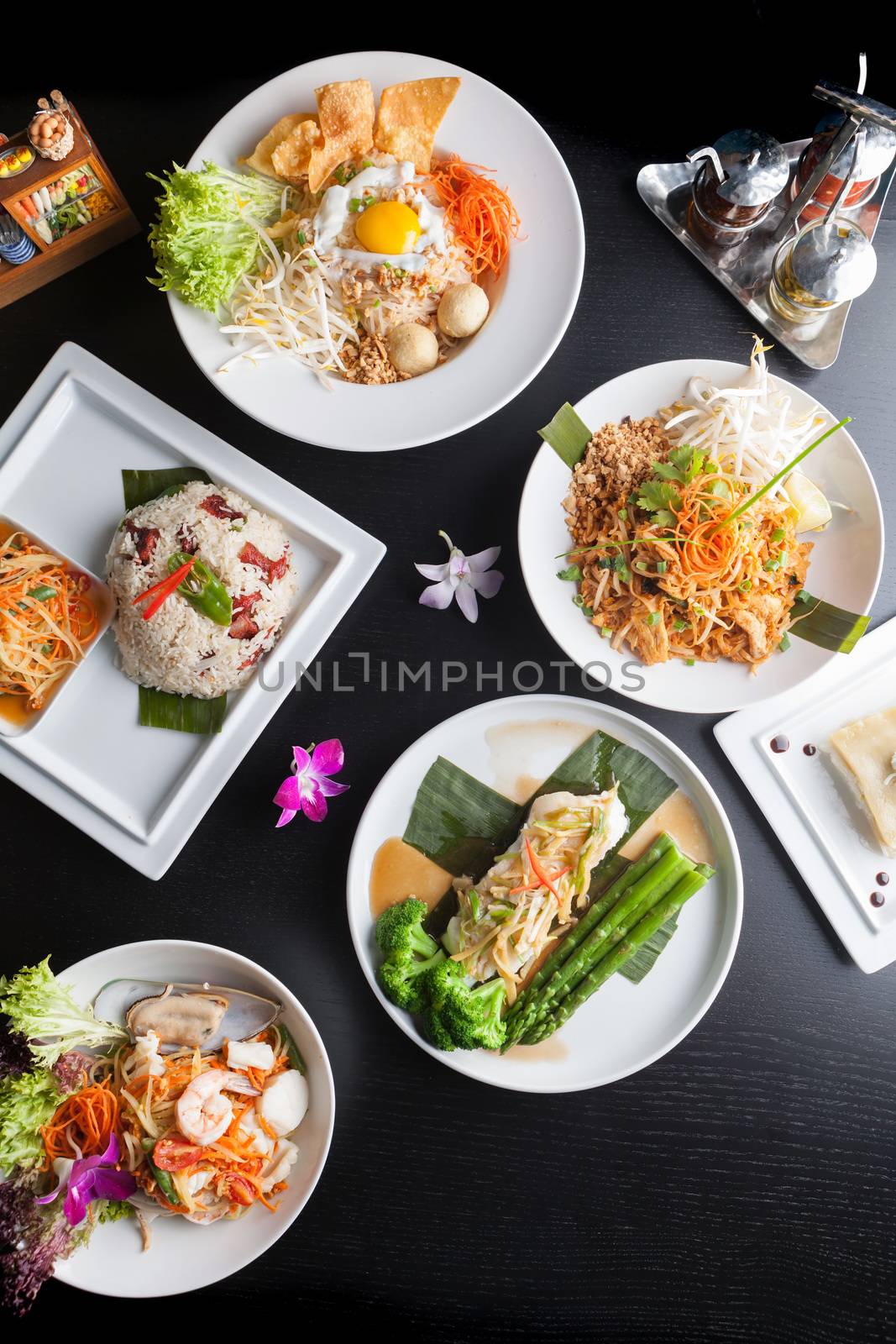 Variety of authentic Thai cuisine and stir fry dishes.  Shallow depth of field.