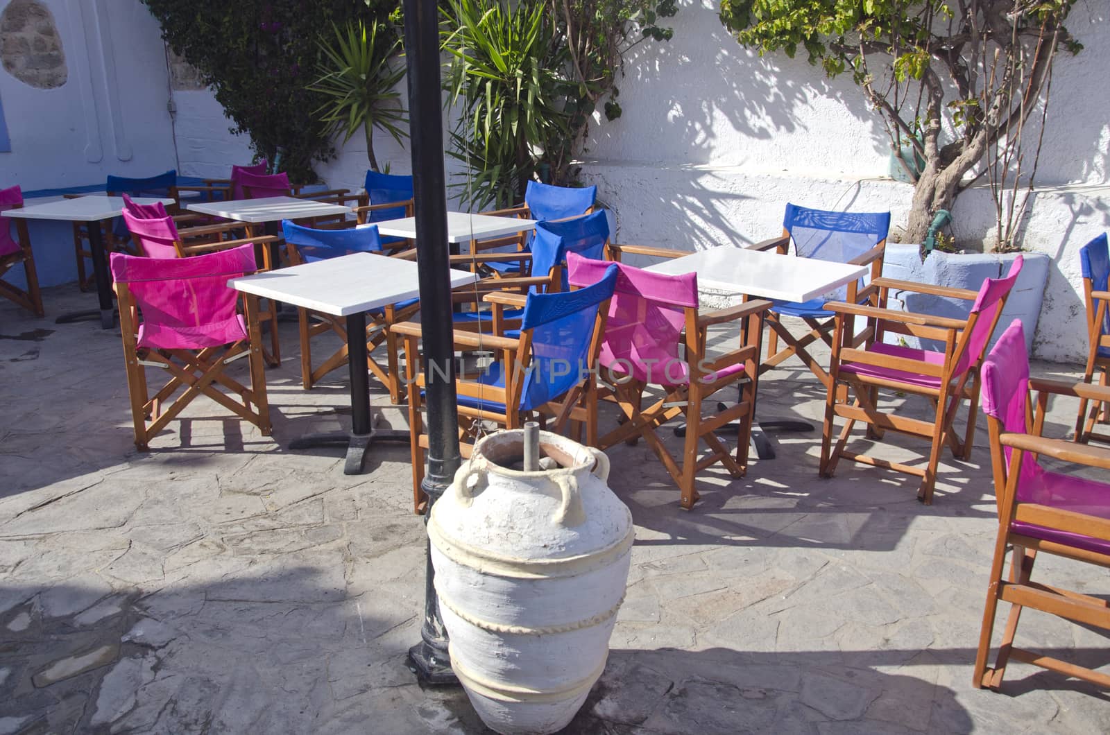 Caffe in Greece with colorful chairs