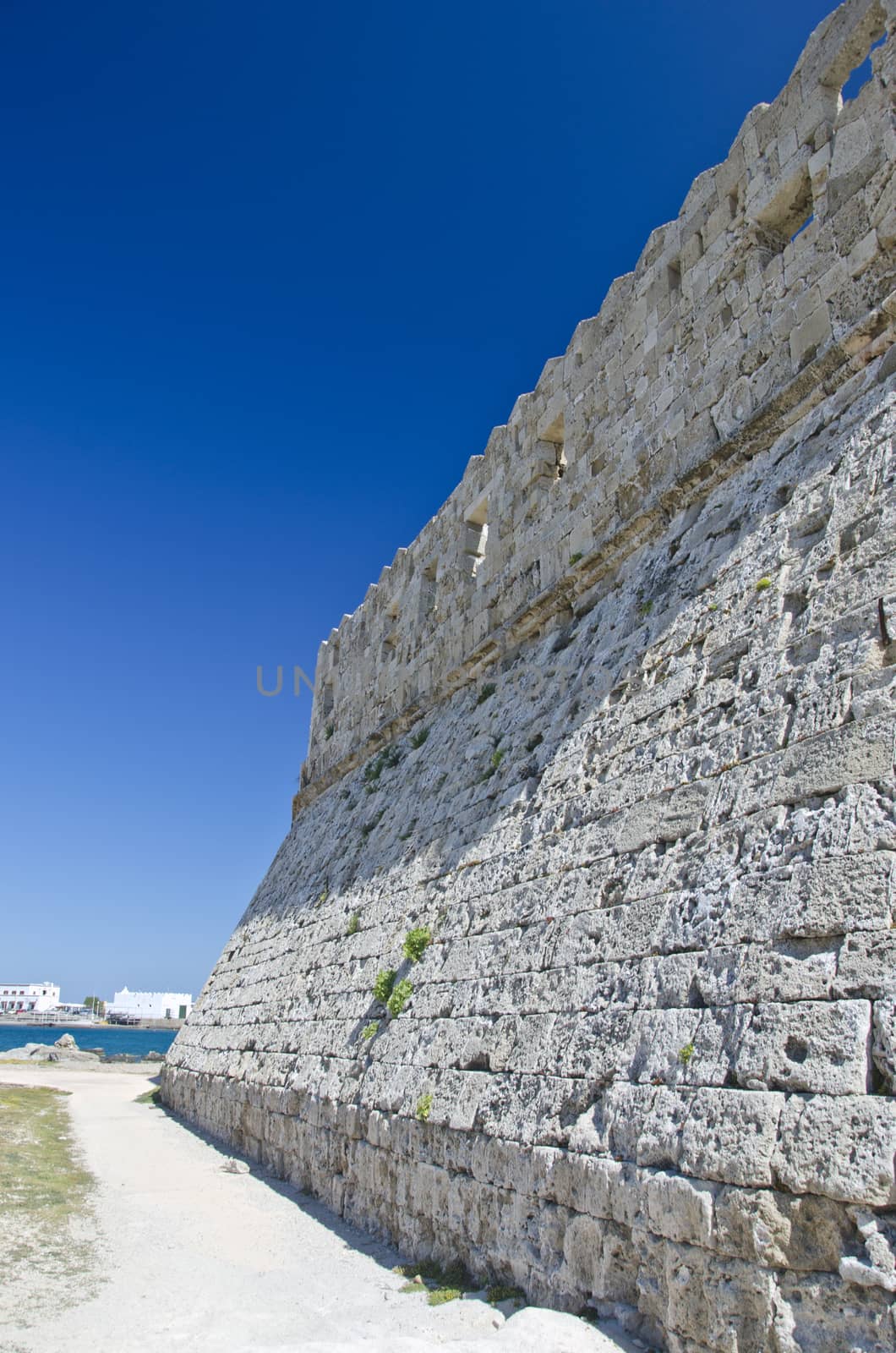 Medieval wall of port fortress in Rhodes, Greece