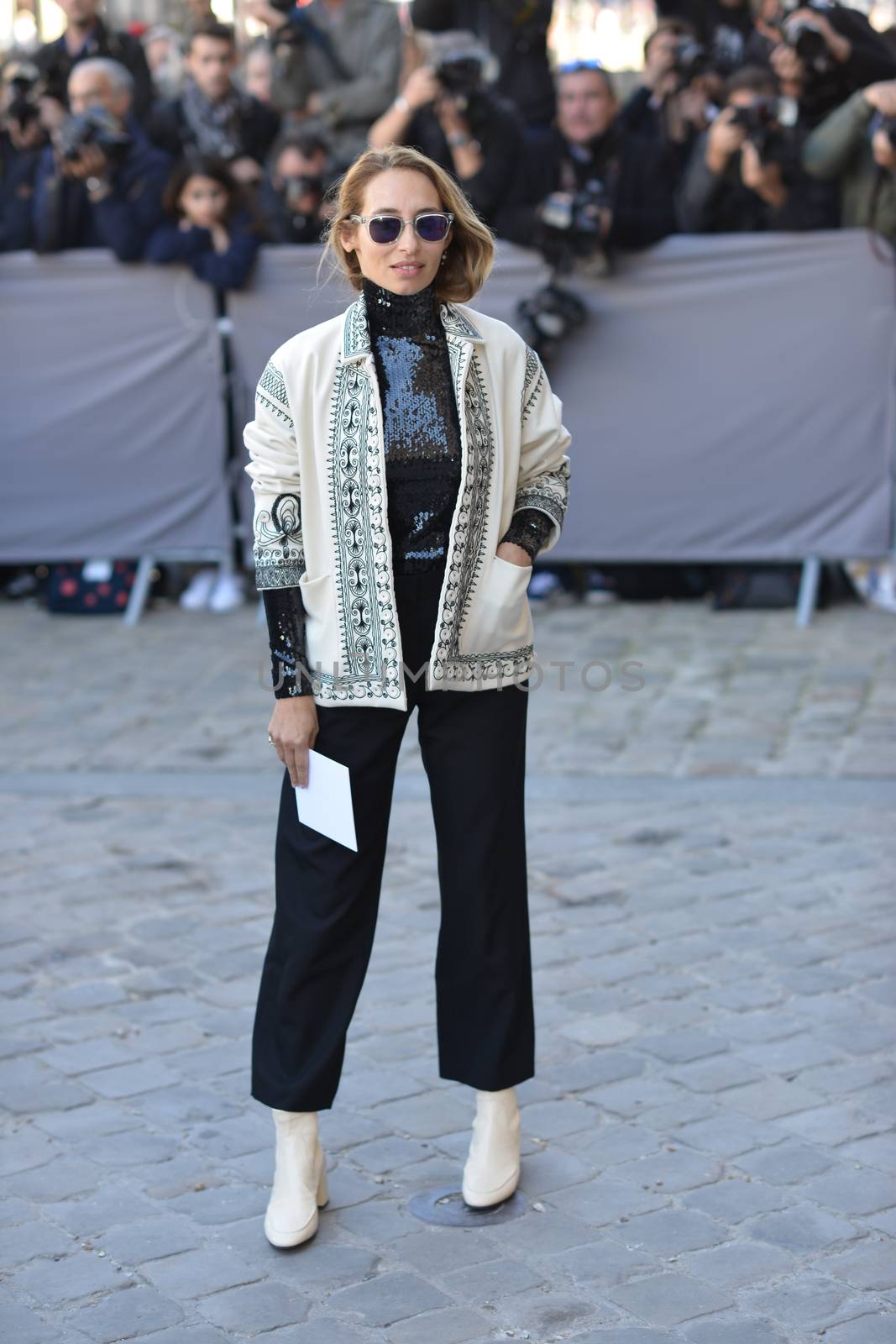 FRANCE, Paris: Alexandra Golovanoff is pictured as she arrives at Dior Fashion Show in Paris on October 2, 2015.