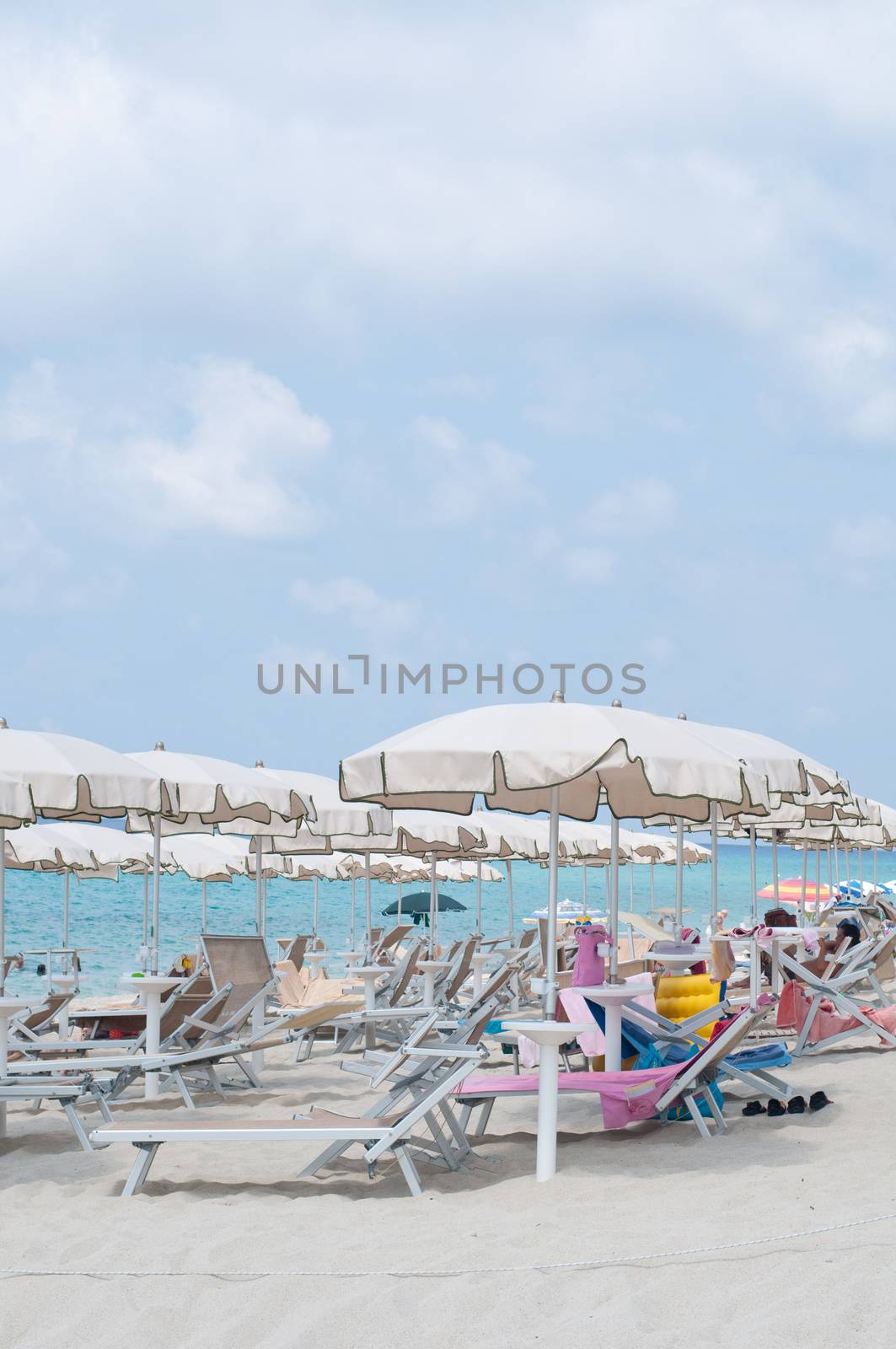 Many umbrellas and chairs at a resort in southern Italy