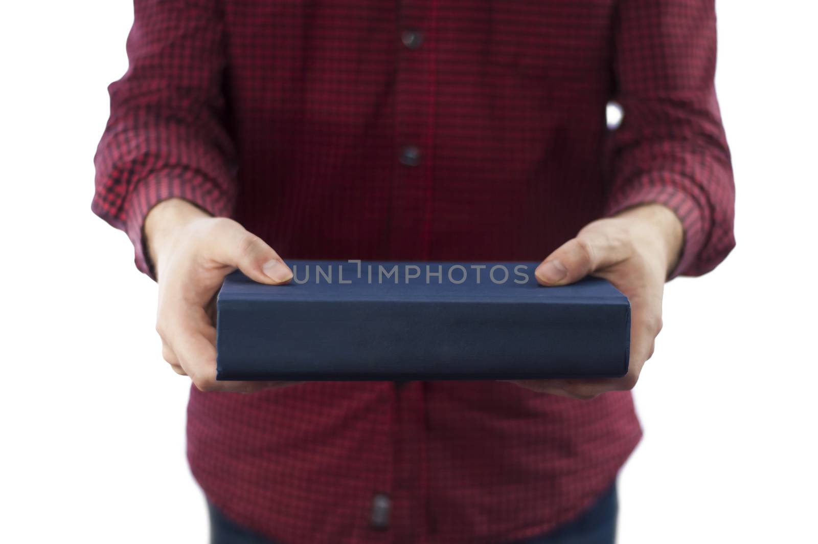 Man holding large closed book with blank spine, isolated on a white background