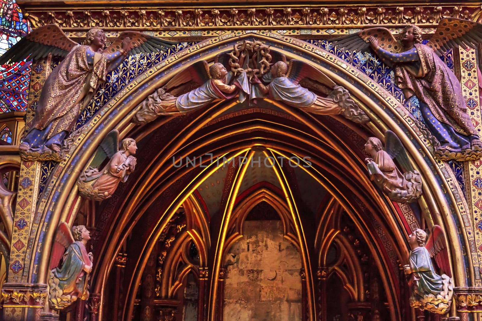 Angels Wood Carvings Cathedral Saint Chapelle Paris France.  Saint King Louis 9th created Sainte Chapelle in 1248 to house Christian relics, including Christ's Crown of Thorns.  Stained Glass created in the 13th Century and shows various biblical stories along with stories from 1200s.