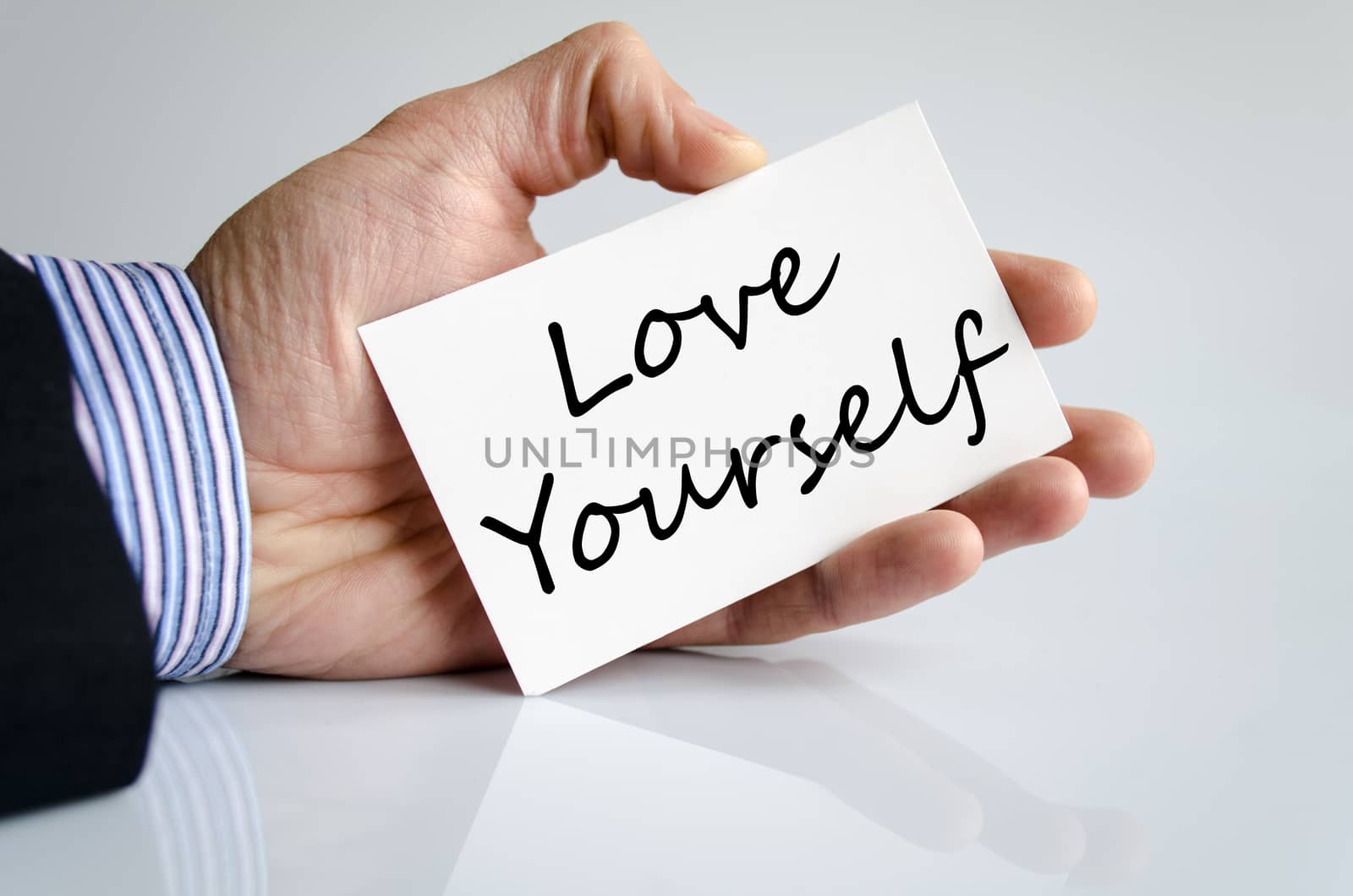Love yourself text concept isolated over white background