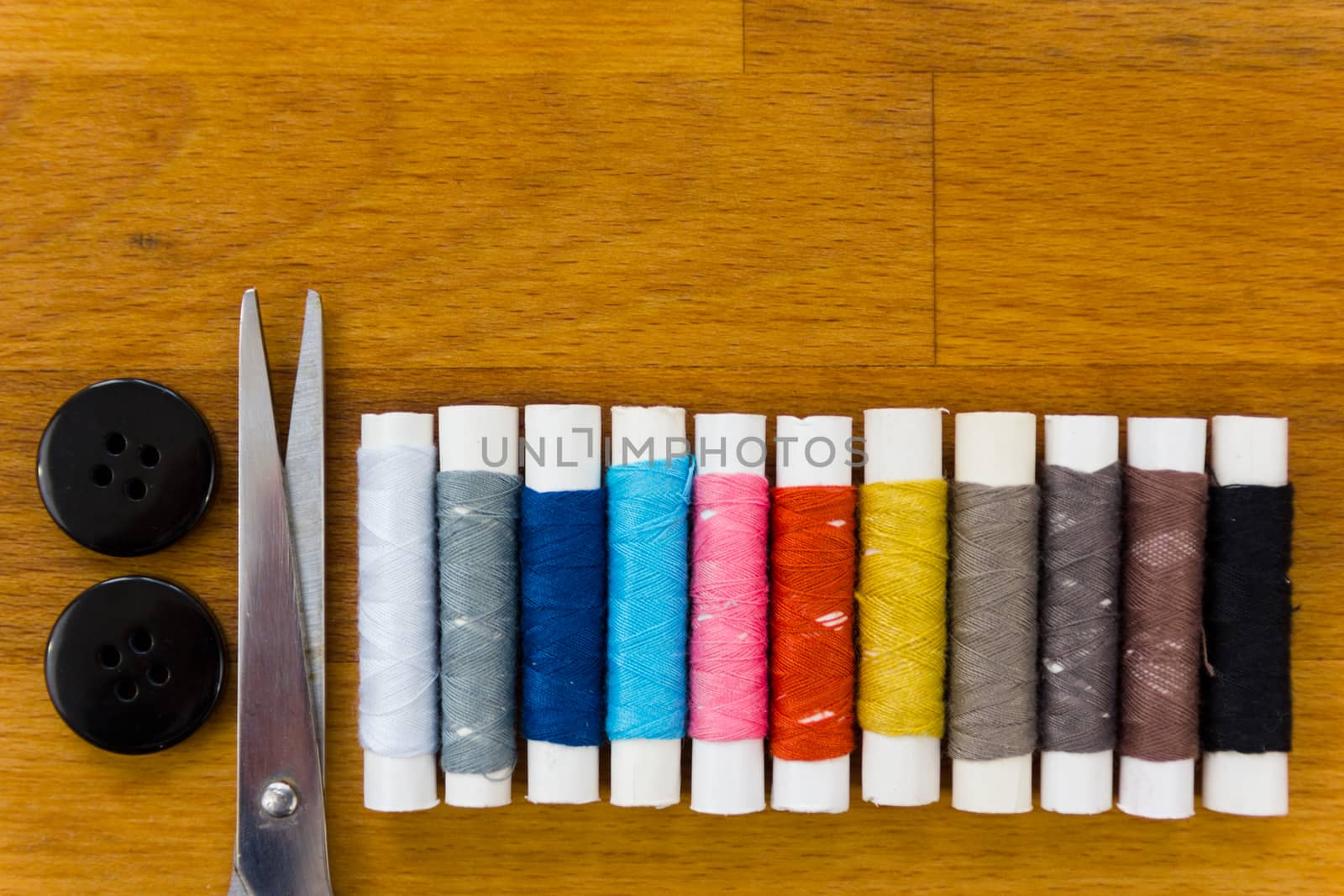 thread, needle, thimble and sewing kits are the Tailor