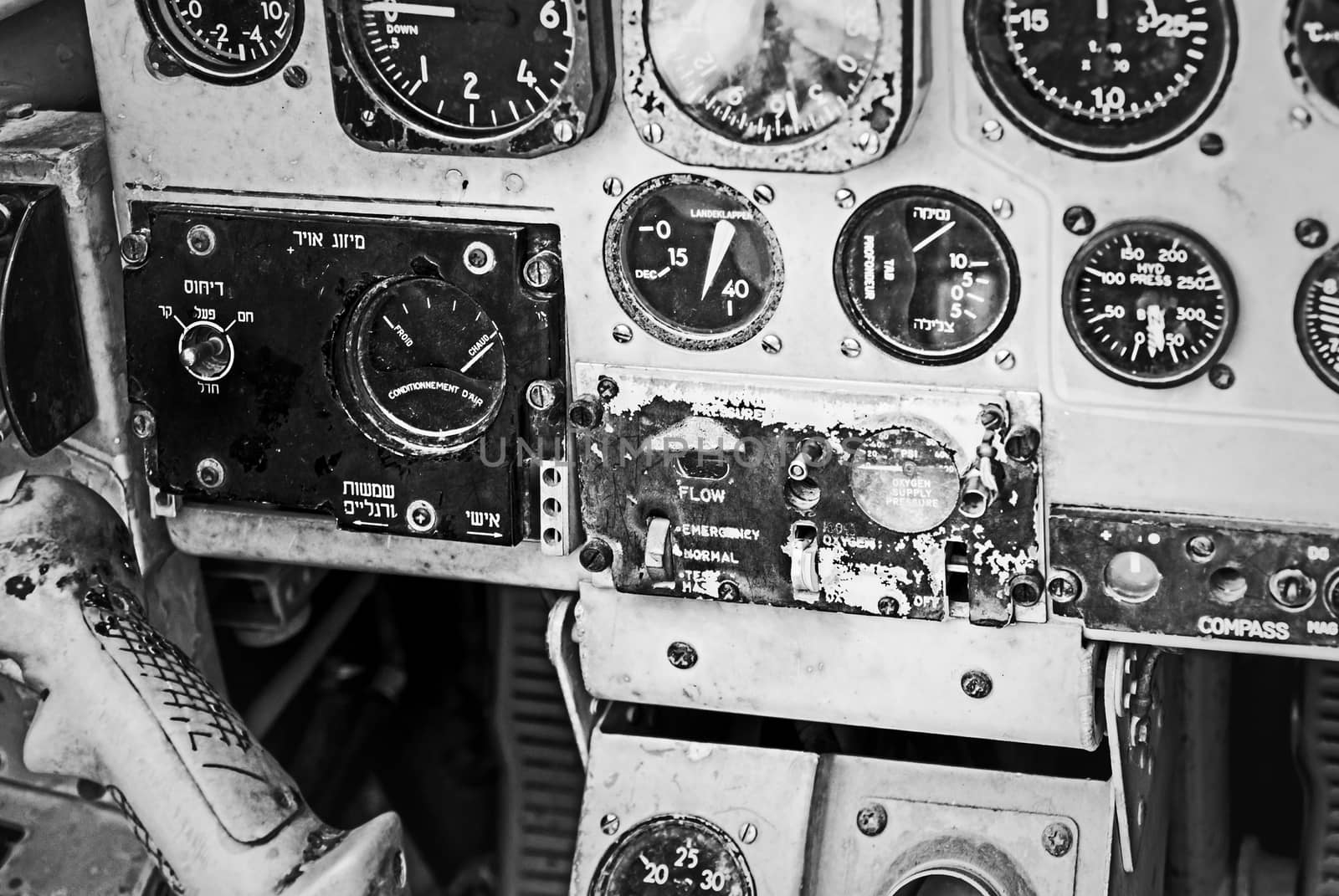 Old device in the pilot cockpit black and white photo