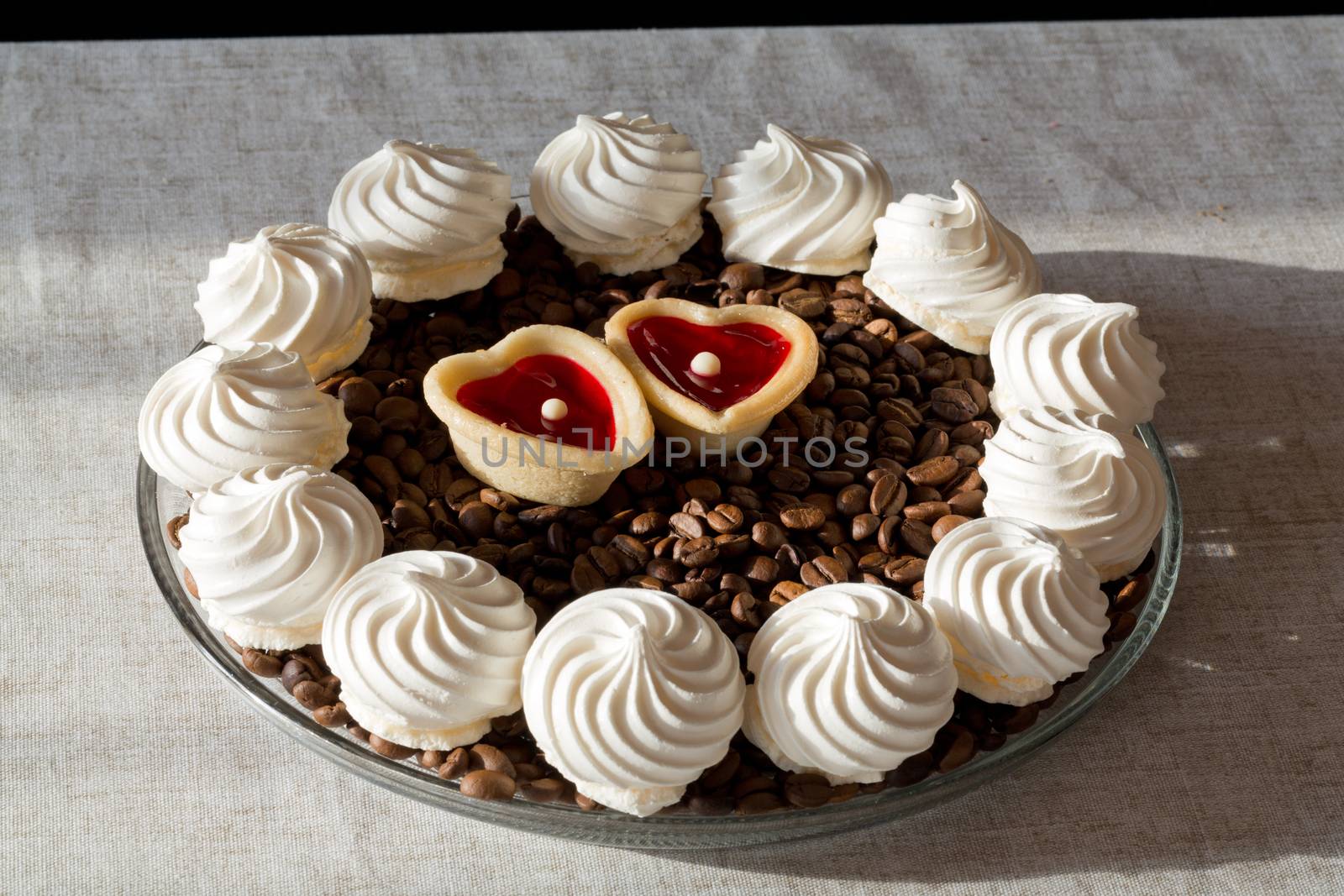 French vanilla meringue cookies and two sweet hearts
