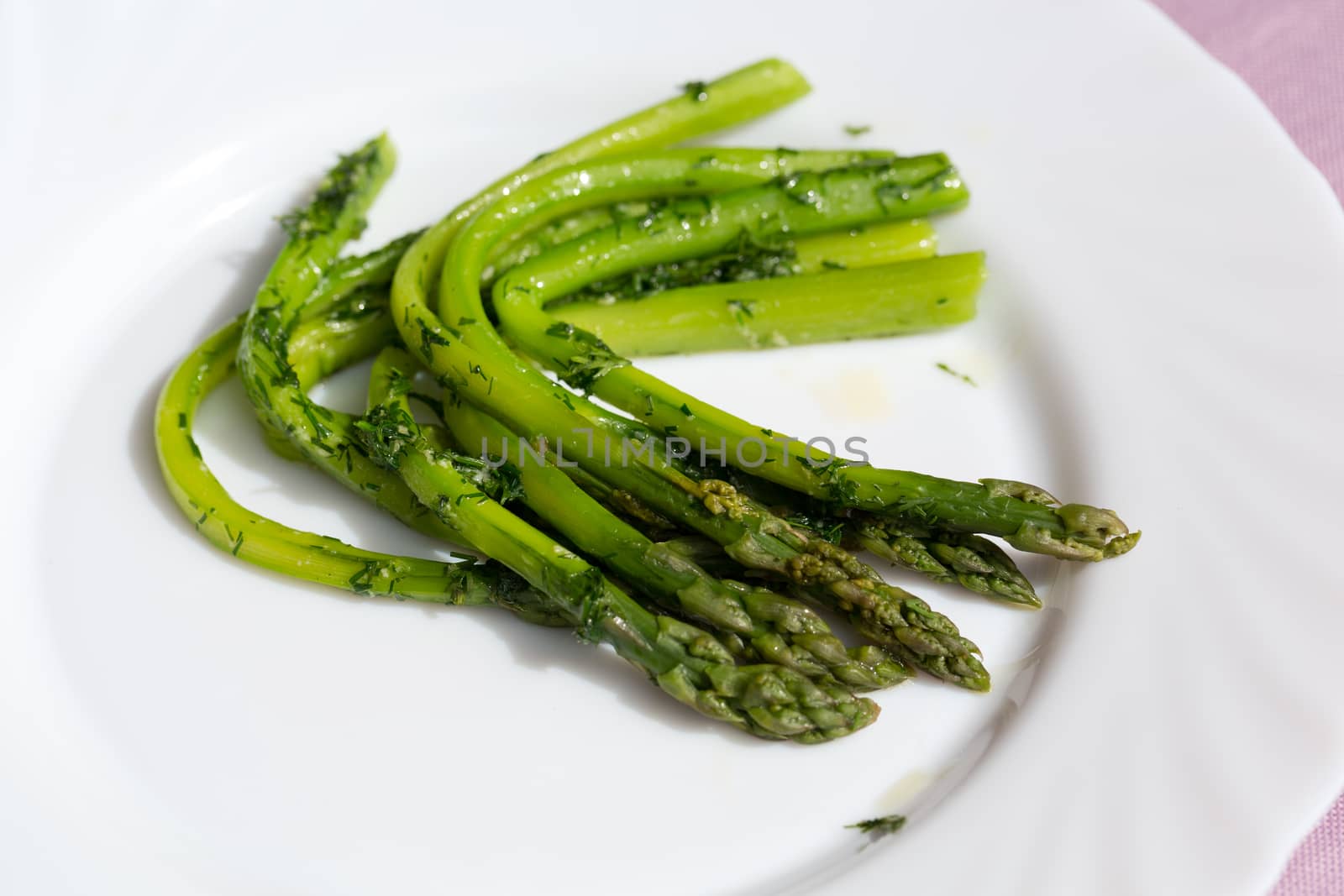 green asparaguses with the fresh dill