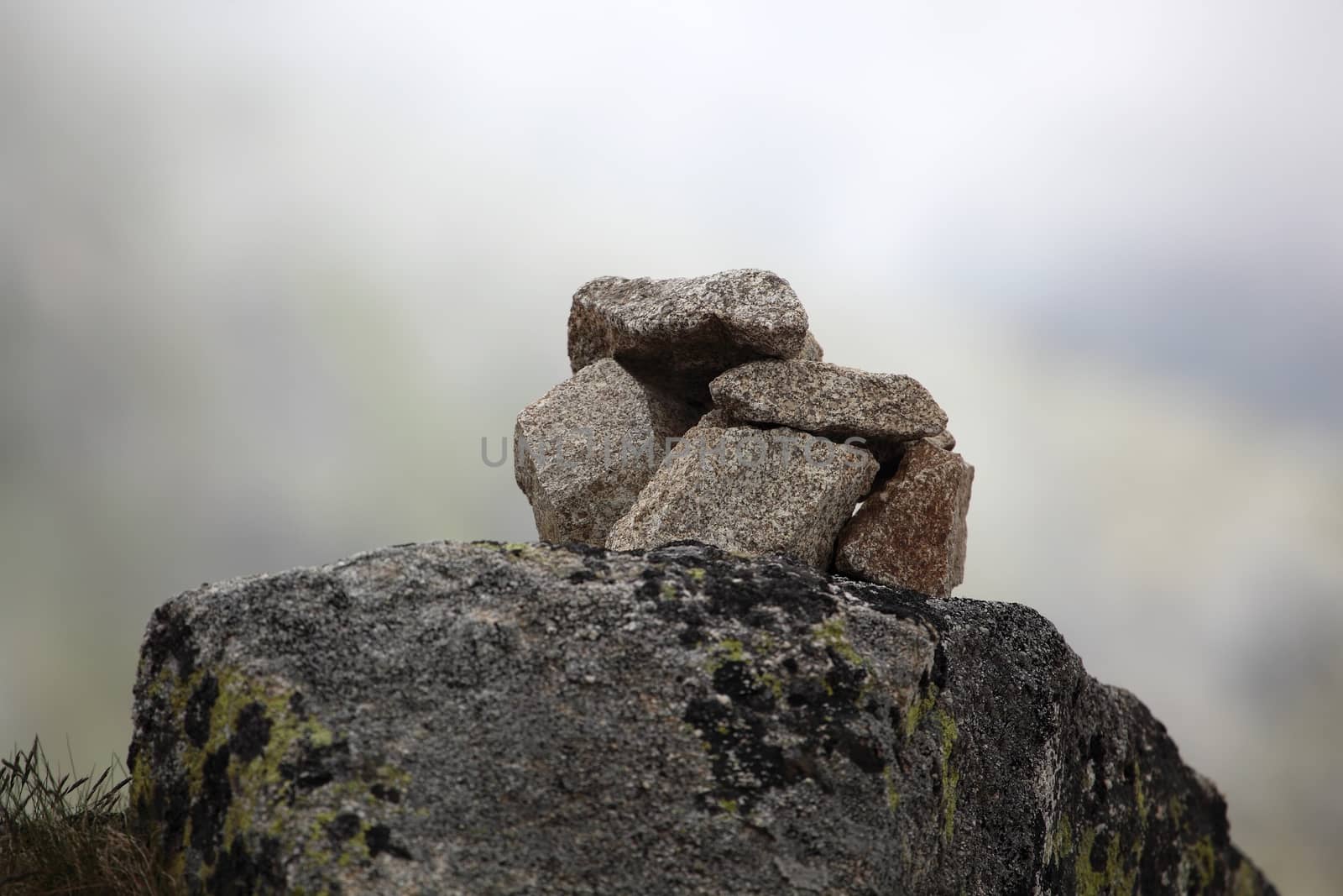 A stack of stones in the mountains.