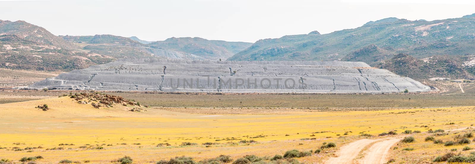 Mine dump bordering the Goegap Nature Reserve  by dpreezg