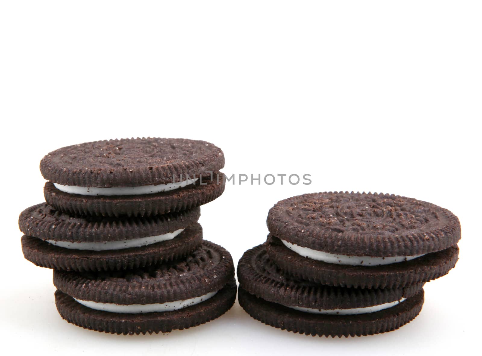 AYTOS, BULGARIA - OCTOBER 04, 2015: Oreo isolated on white background. Oreo is a sandwich cookie consisting of two chocolate disks with a sweet cream filling in between. by nenov