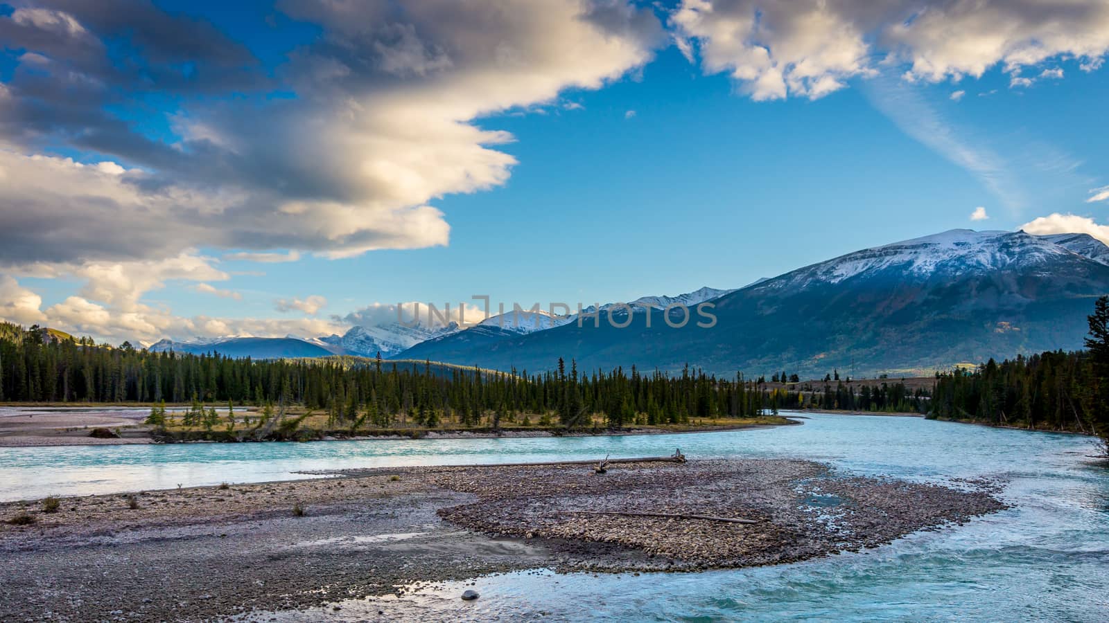 Daybreak over the Athabasca River near the town of Jasper in Jasper National Park in the Canadian Rocky Mountains