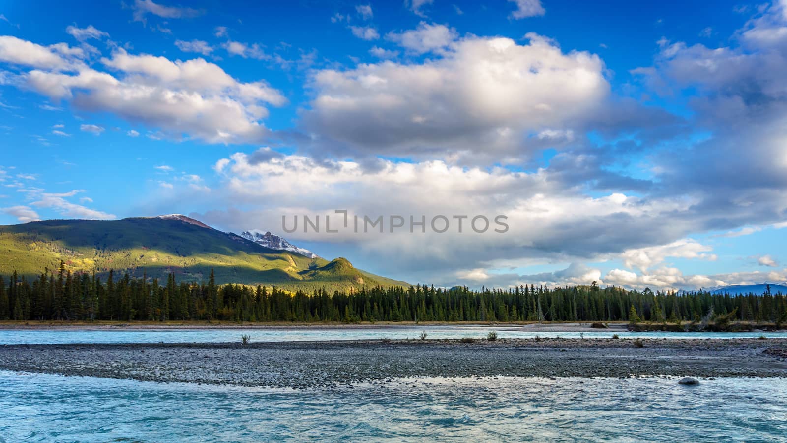 Daybreak over the Athabasca River near the town of Jasper in Jasper National Park in the Canadian Rocky Mountains