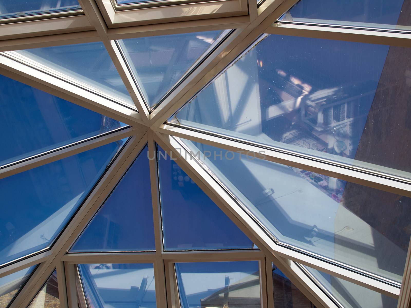Architectural Abstract modern Glass roof ceiling dome in a mall         