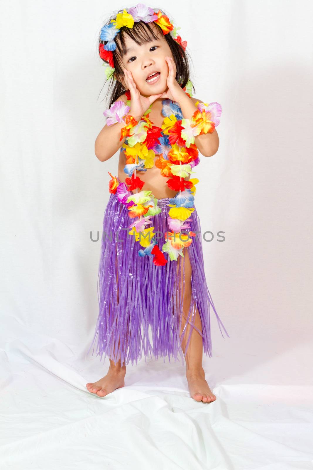 Asian Chinese little girl in hawaiian costume