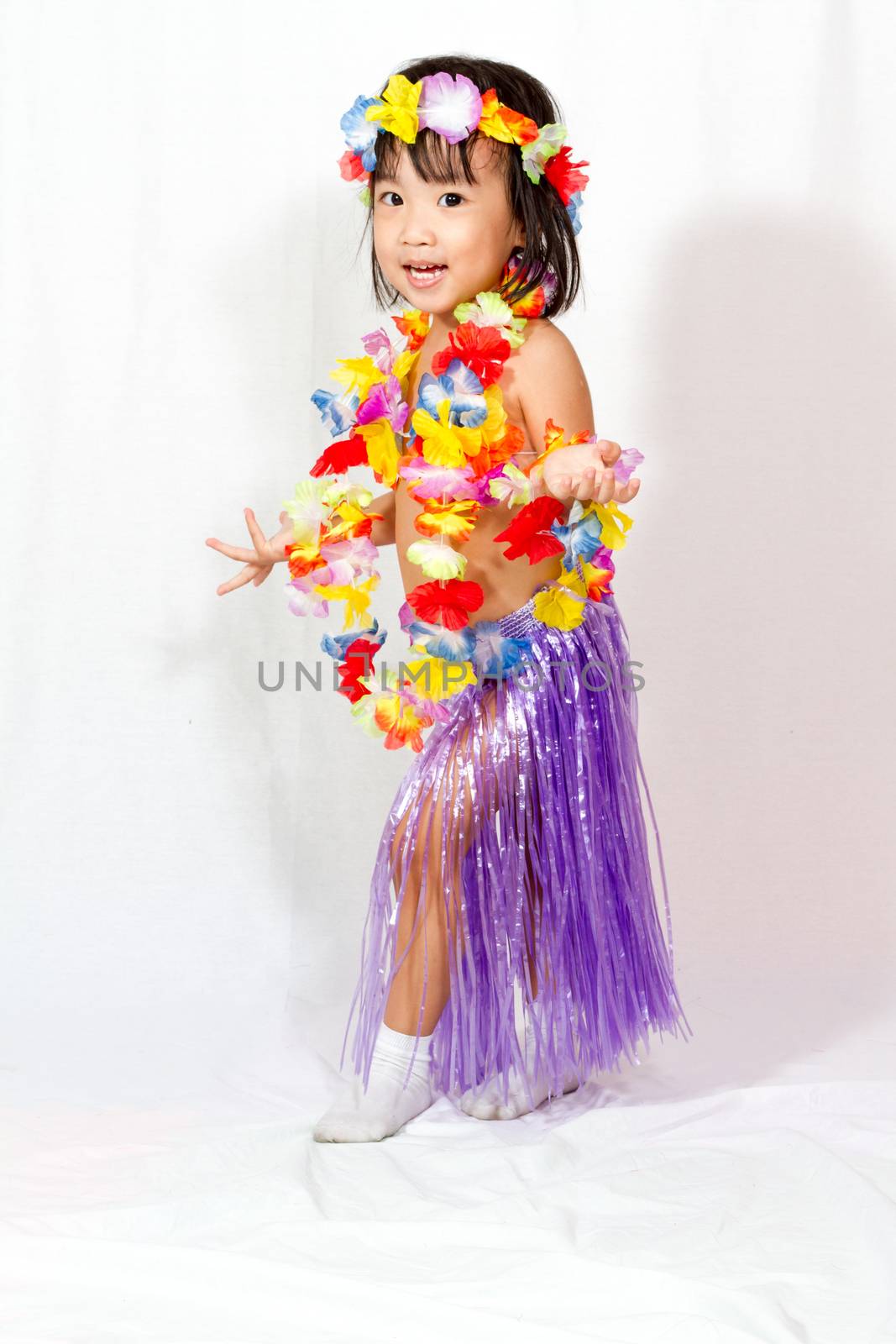 Asian Chinese little girl in hawaiian costume