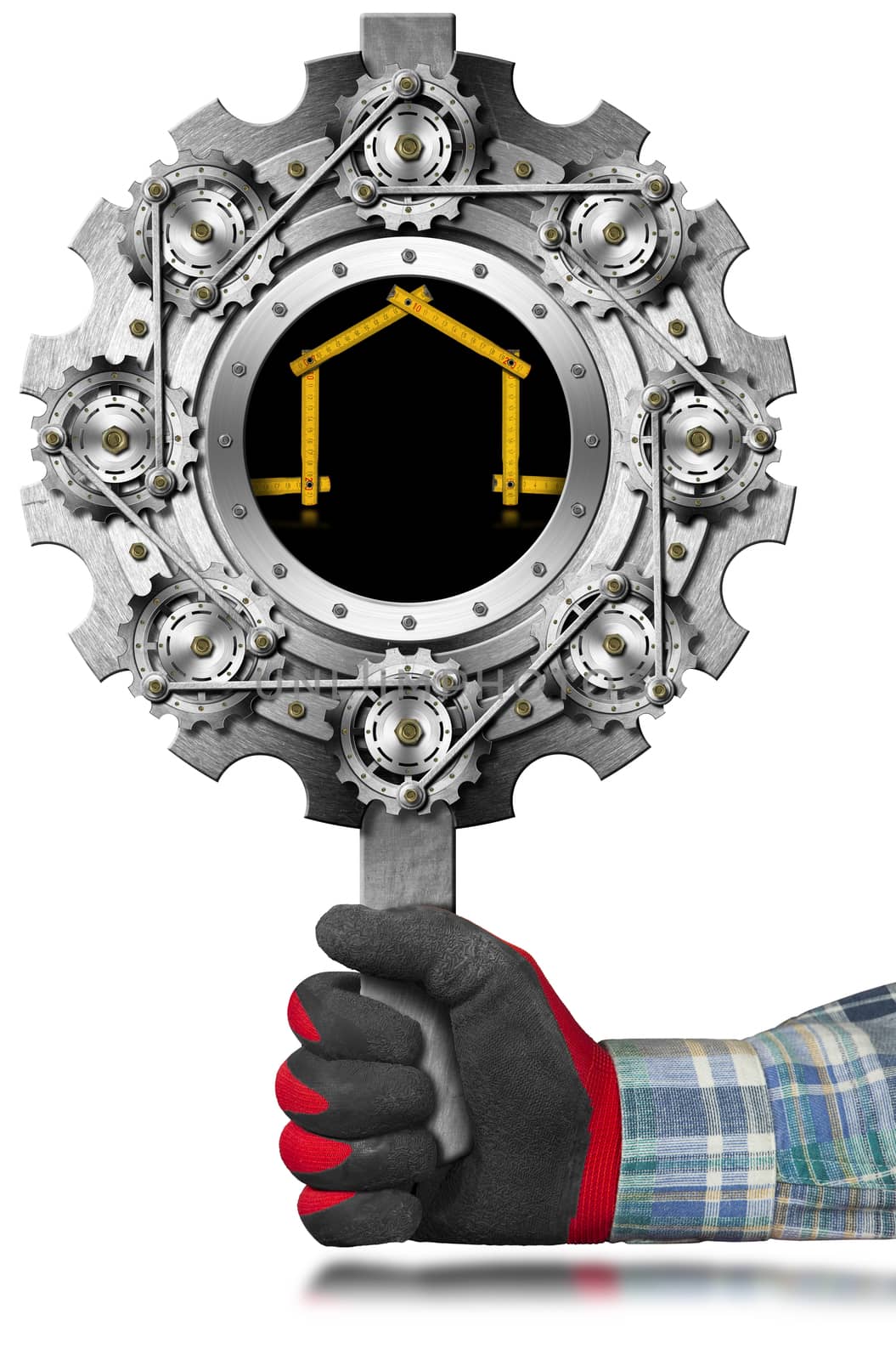 Hand with work glove holding a metal sign in the shape of gear with a meter ruler in the shape of house. Sign for the construction industry