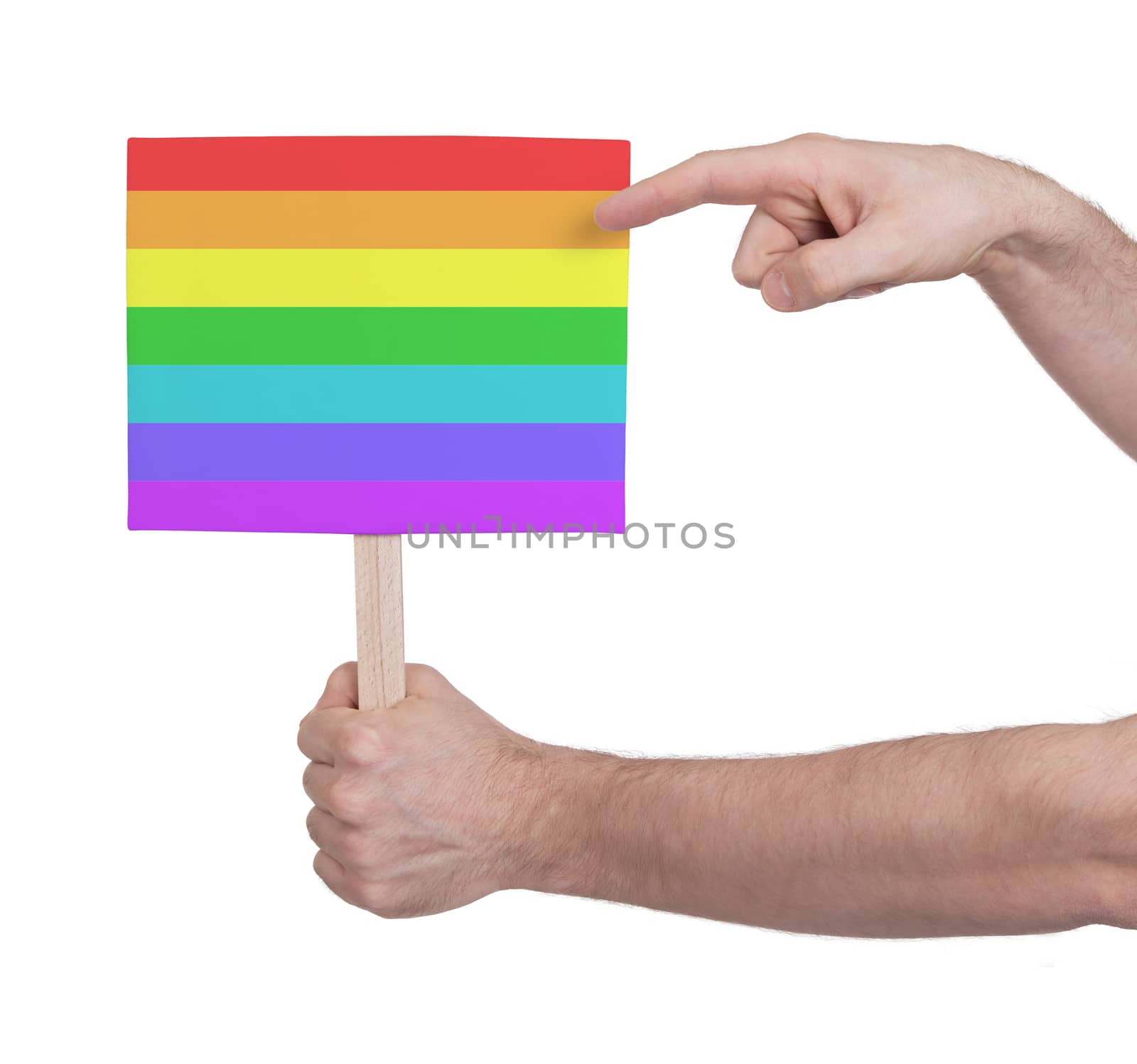 Hand holding small card - Flag of Rainbow flag by michaklootwijk